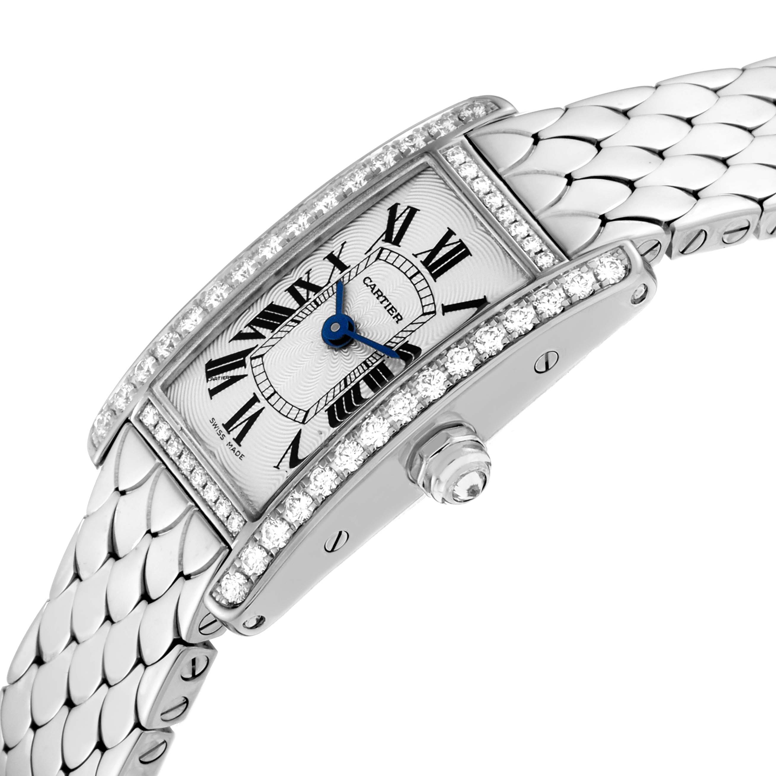 The image shows a Cartier Tank Americaine WB710013 Women's White Gold Silver Dial WB710013 Women's White Gold Silver Dial watch angled from the side, highlighting the face, crown, and part of the bracelet.