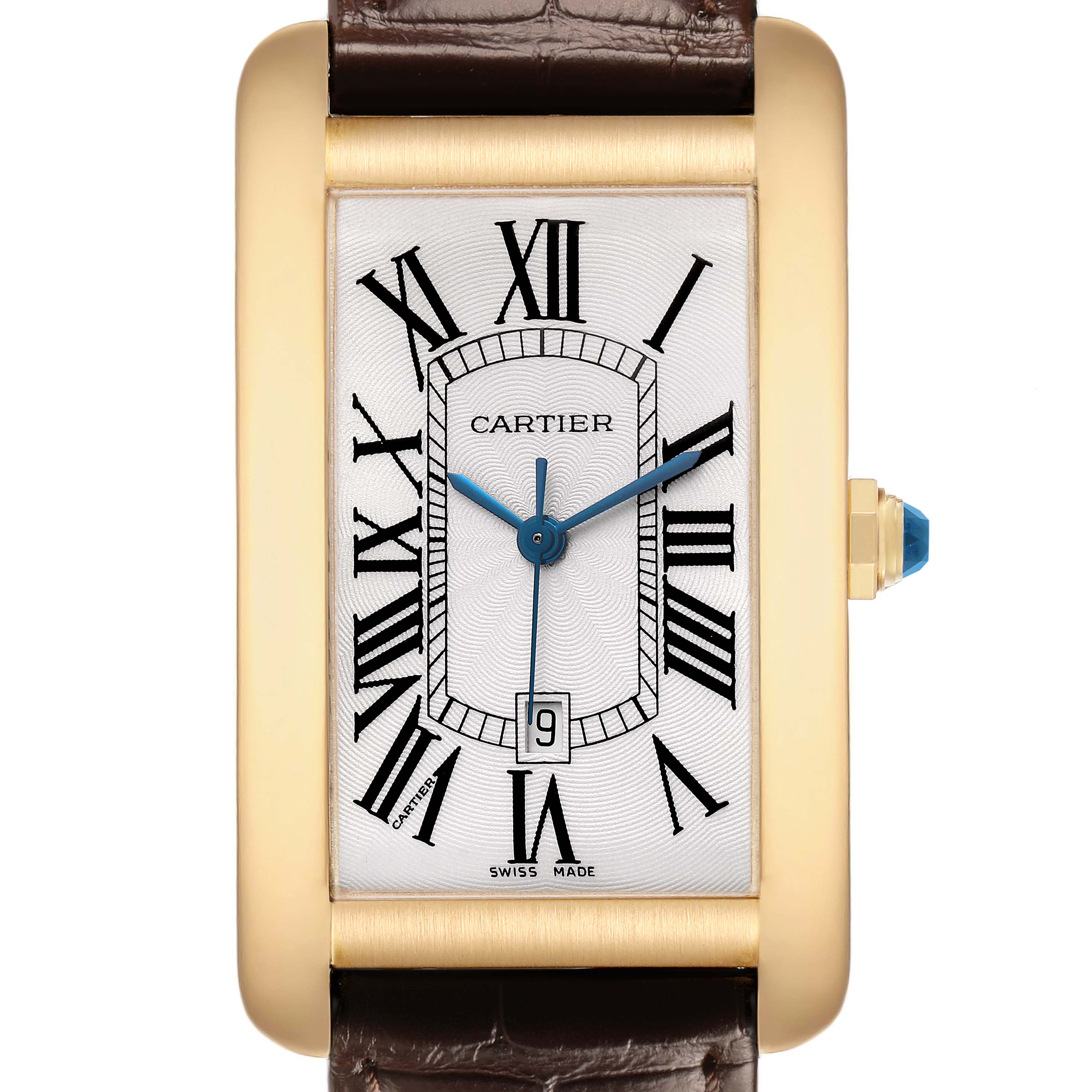 The Cartier Tank Americaine W2603156 Men's Yellow Gold Silver Dial watch is shown from the front, highlighting its rectangular dial, Roman numerals, and blue hands.