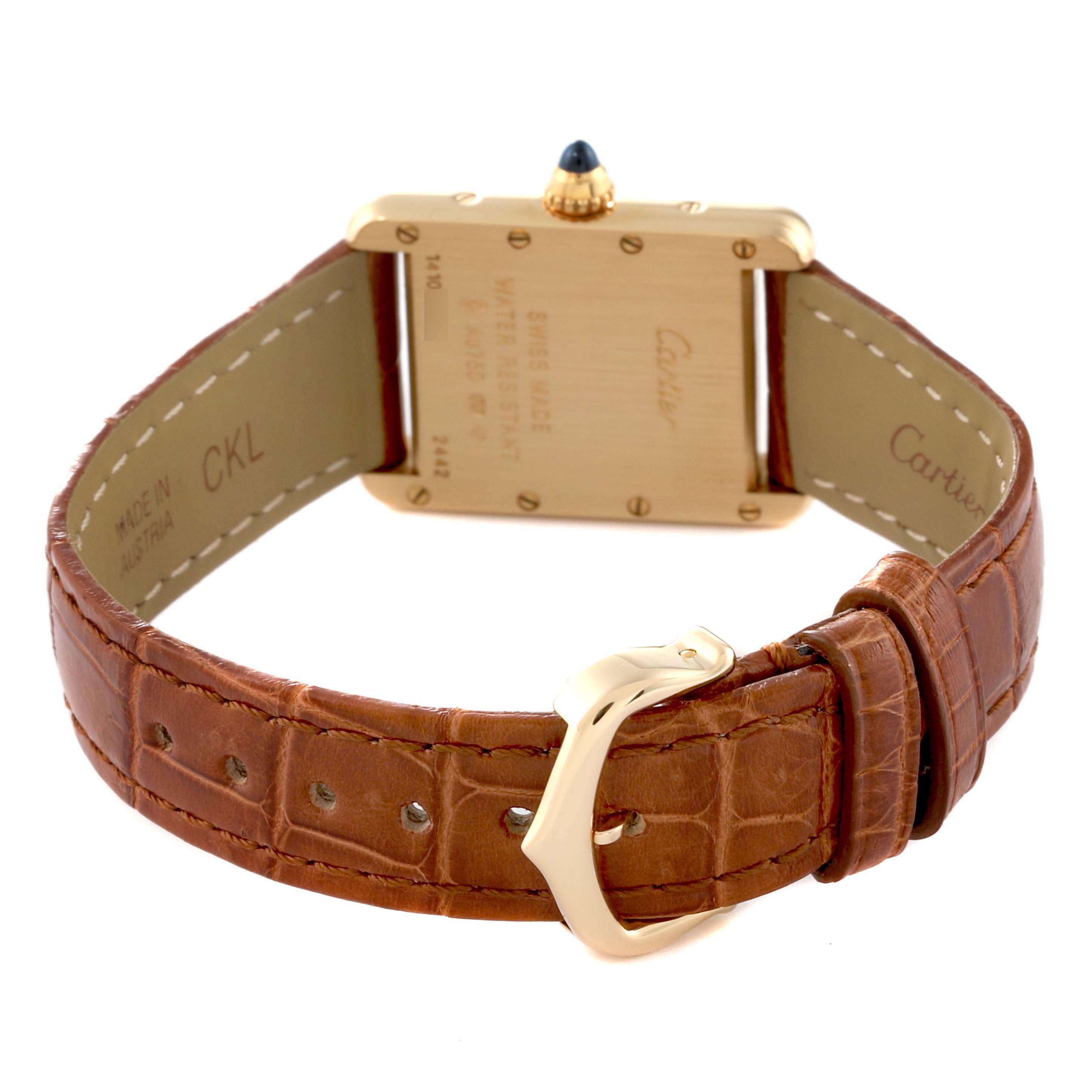 This image shows the back of a Cartier Tank Louis W1529856 Women's Yellow Gold Silver Dial W1529856 Women's Yellow Gold Silver Dial watch and its brown strap with buckle.