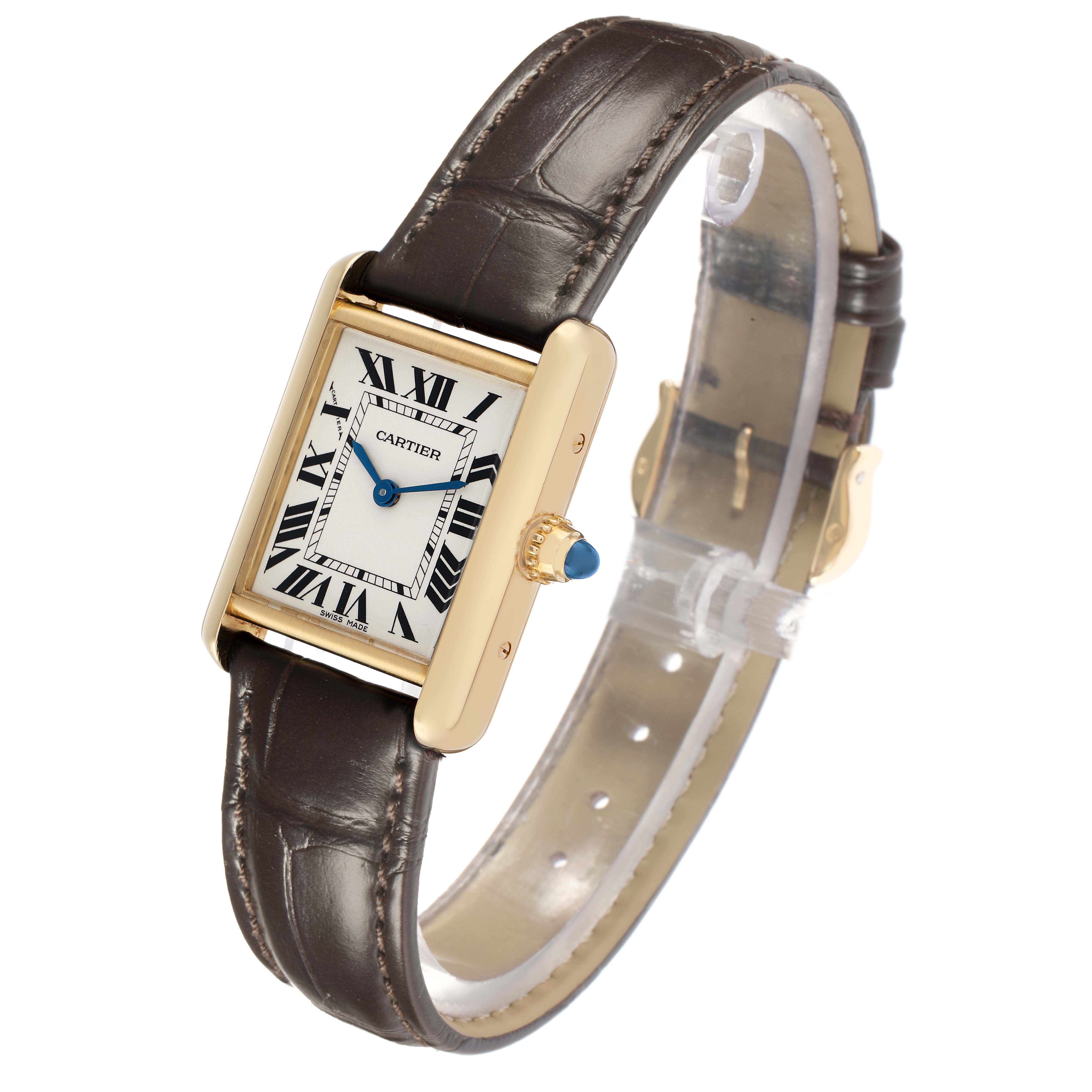 The Cartier Tank Louis W1529856 Women
s Yellow Gold Silver Dial watch is shown at an angle displaying the face, Roman numerals, crown, and leather strap.