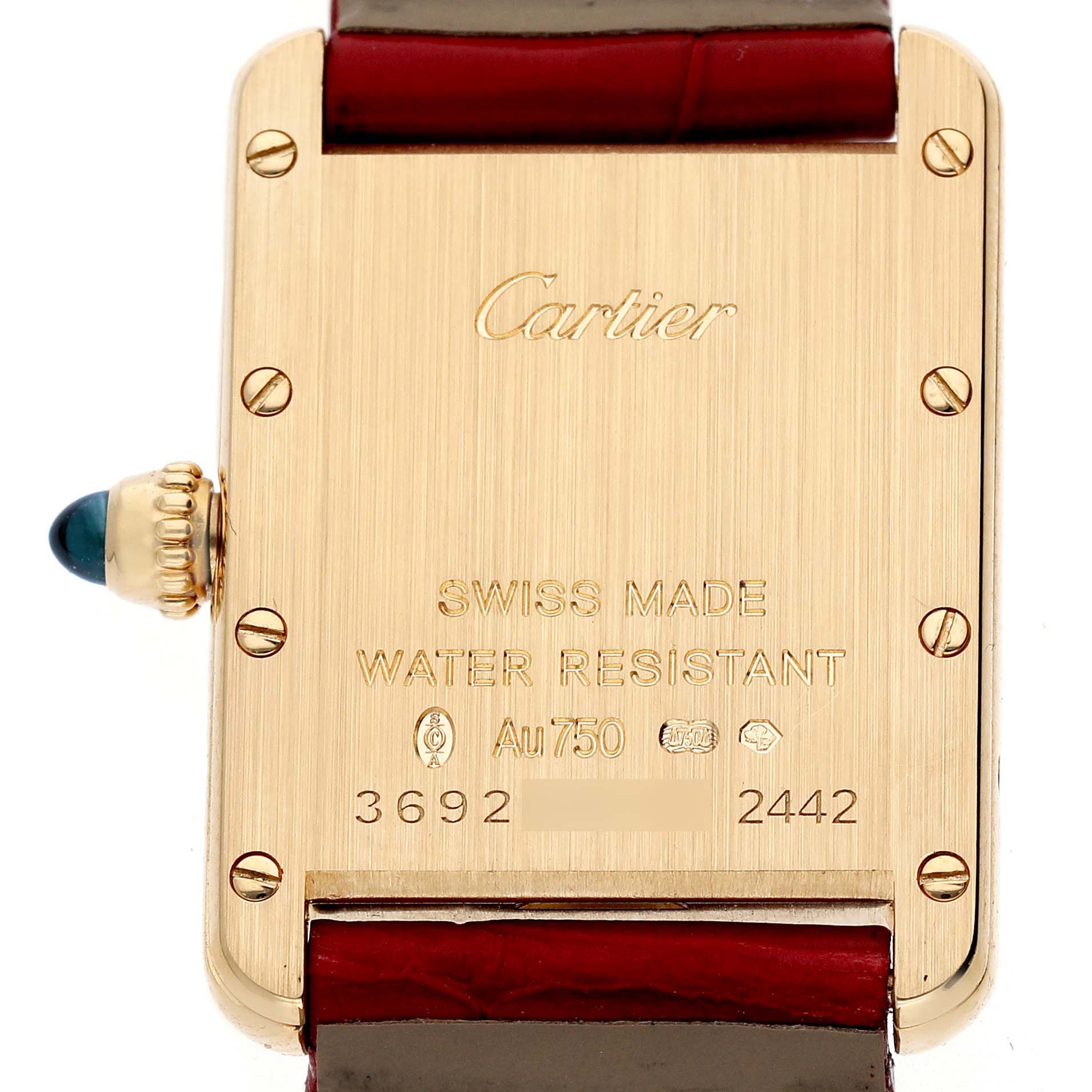 The image shows the back of a Cartier Tank Louis W1529856 Women's Yellow Gold Silver Dial watch, highlighting the text, screws, and crown.