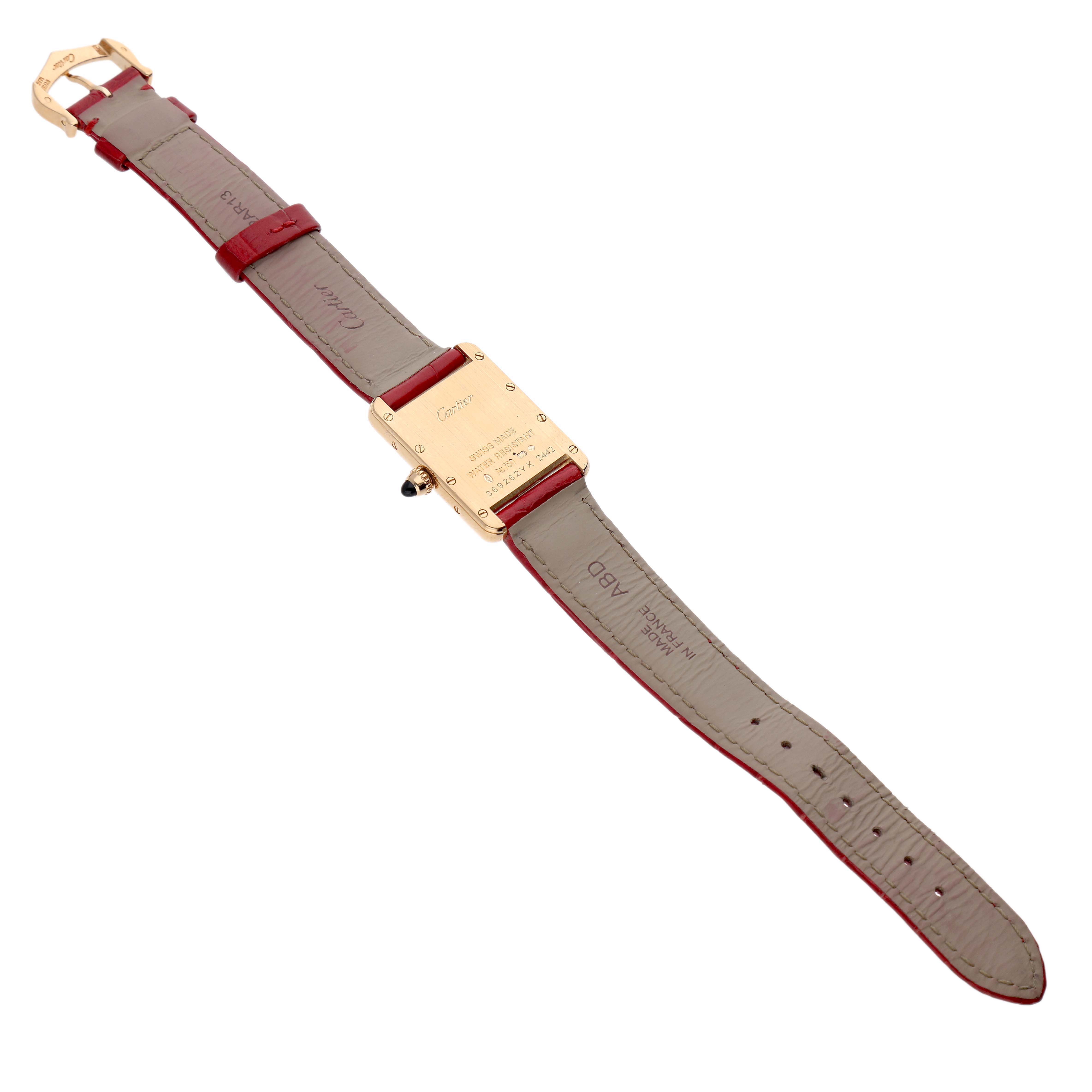 The image shows the back view of the Cartier Tank Louis W1529856 Women's Yellow Gold Silver Dial watch, displaying the rear case and leather strap.