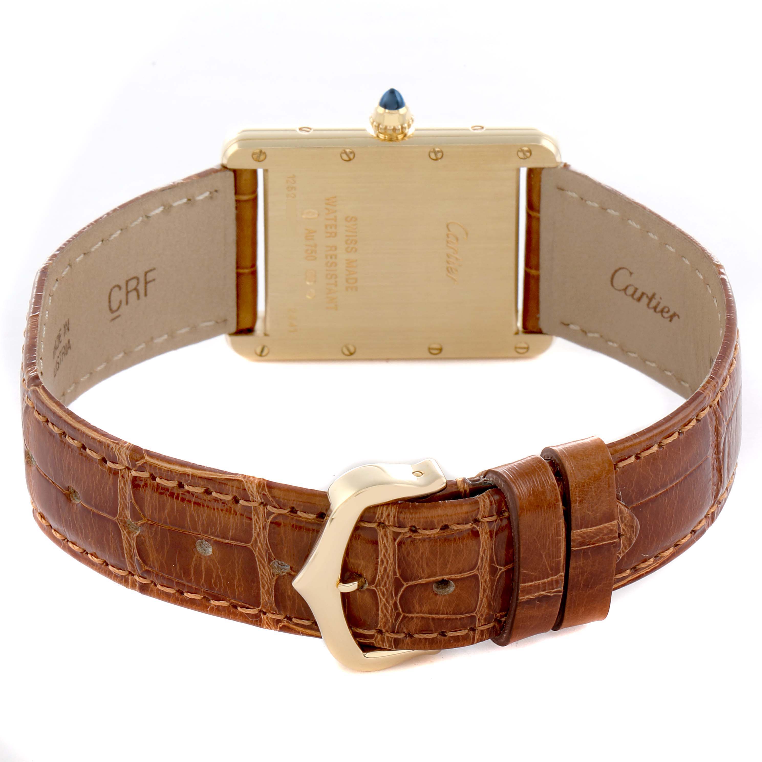 The image shows the back of the Cartier Tank Louis W1529756 Men
s Yellow Gold Silver Dial watch, highlighting its clasp, leather strap, and engraved case back.