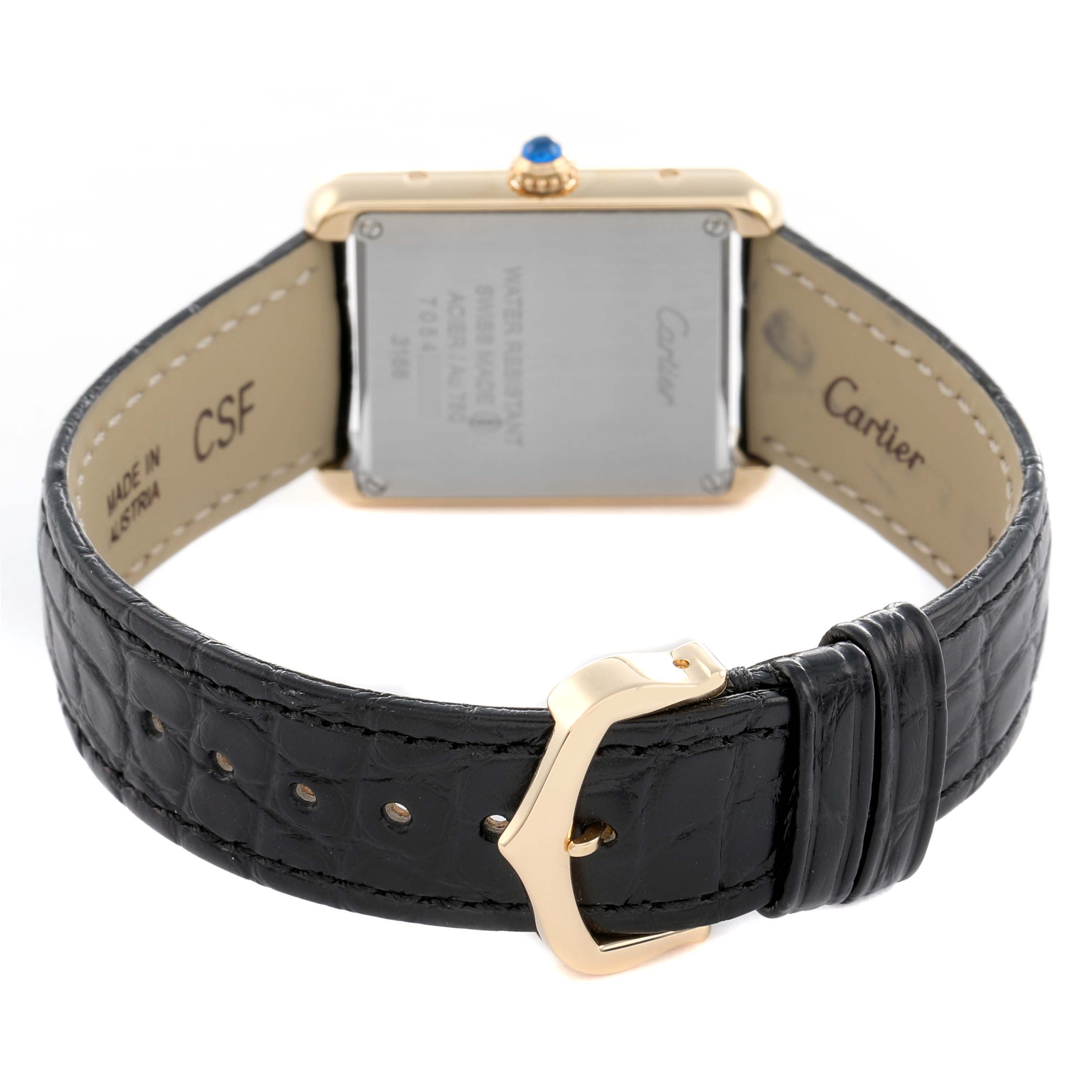 The Cartier Tank Solo W5200002 Women
s Steel and Gold (two tone) Silver Dial model watch is shown from the back, highlighting the case back, crown, and leather strap with buckle.