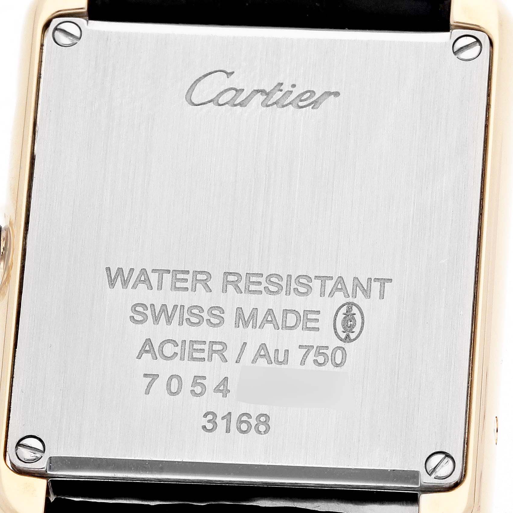 The image shows the back case of the Cartier Tank Solo W5200002 Women
s Steel and Gold (two tone) Silver Dial watch, showcasing branding and specifications.
