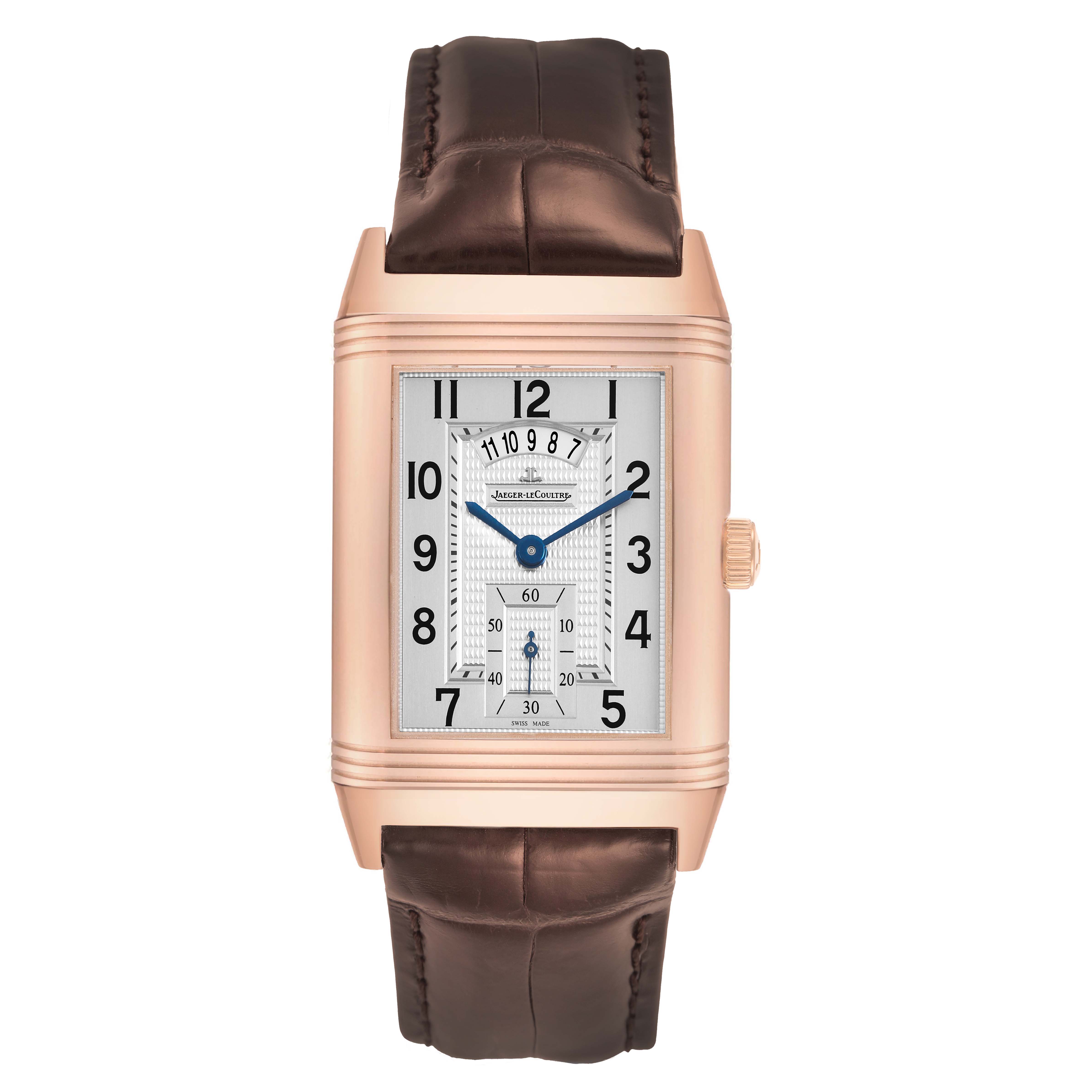 The image shows a Jaeger-LeCoultre Reverso watch, front view, highlighting its rectangular face, dial, and leather strap.