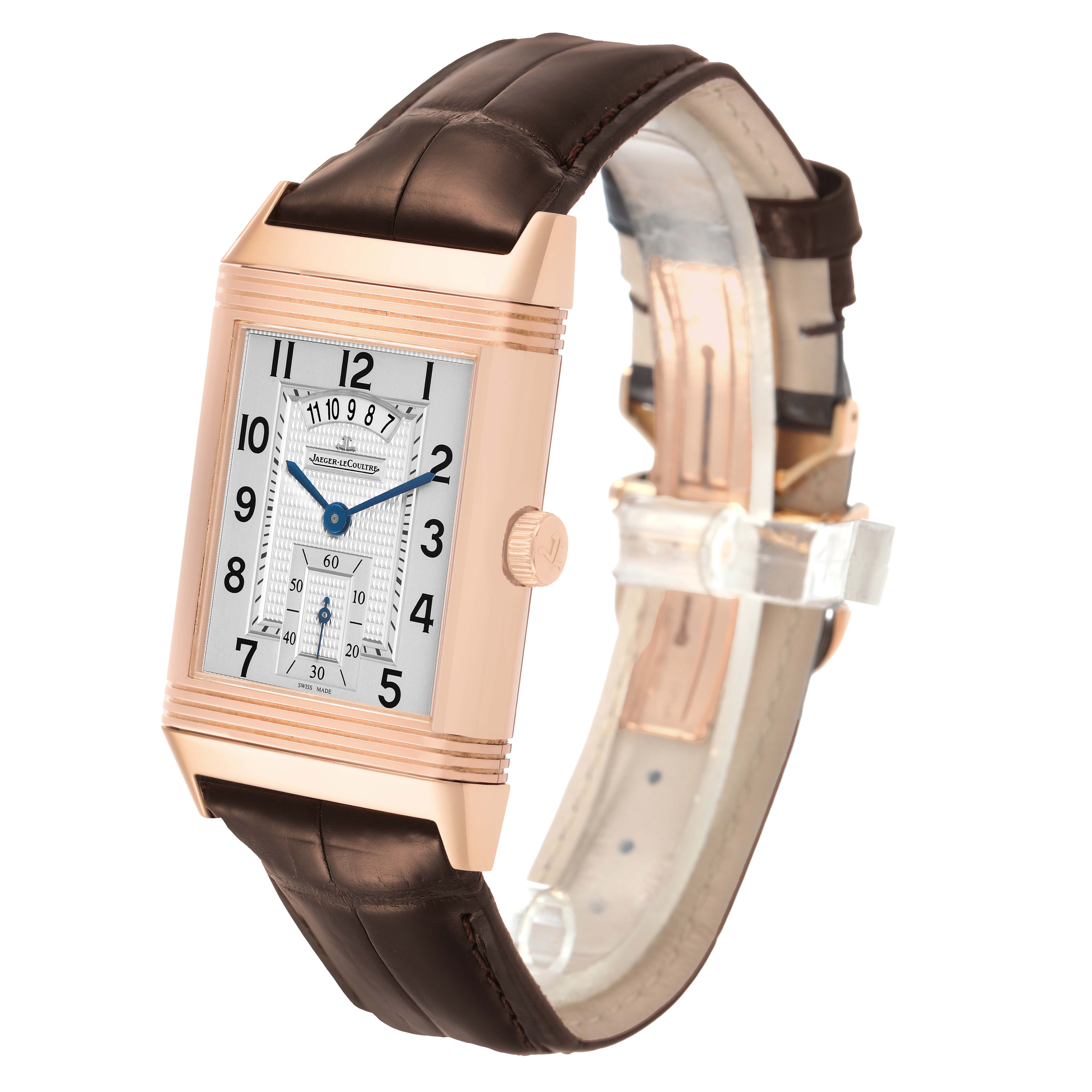 The Jaeger-LeCoultre Reverso watch is shown at a slight angle, revealing the face, crown, strap, and case details.