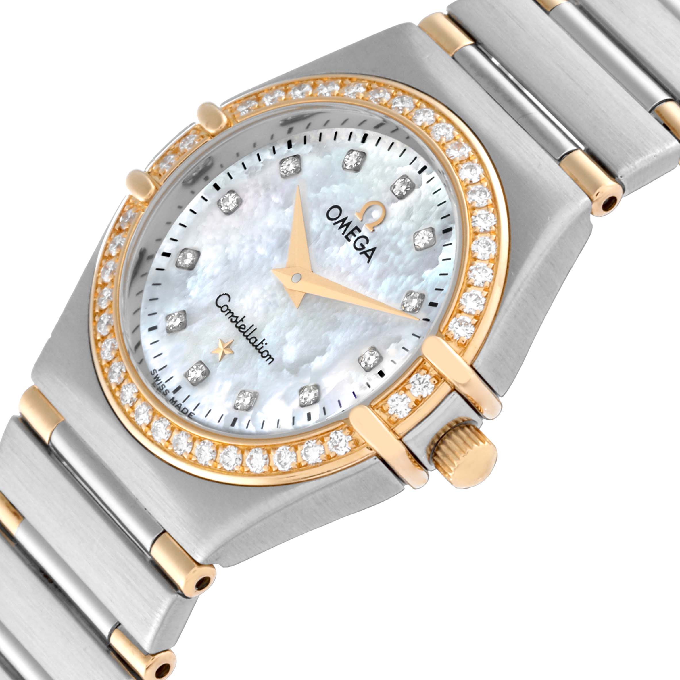 The Omega 1267.75.00 Women's Steel and Gold (two tone) Mother of Pearl Dial 1267.75.00 Women's Steel and Gold (two tone) Mother of Pearl Dial Constellation 95 MOP Diamond Yellow Gold Steel Ladies Watch 1267.75.00 is shown at an angled close-up, highlighting its diamond-studded bezel, mother-of-pearl dial, and part of the bracelet.