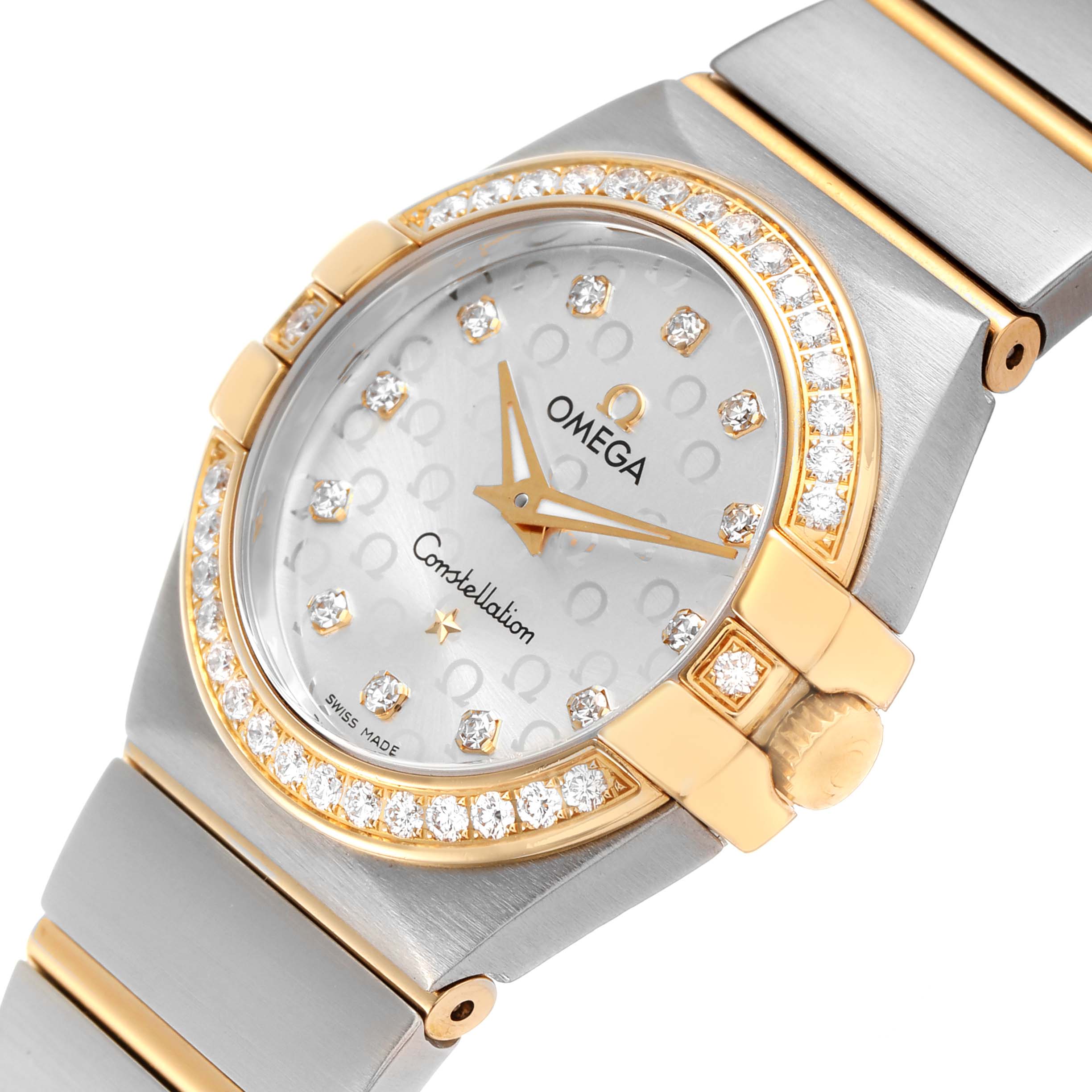 The Omega 123.25.27.60.52.002 Women's Steel and Gold (two tone) Silver Dial Constellation Steel Yellow Gold Diamond Watch is shown at an angle highlighting the bezel, dial, and part of the bracelet.