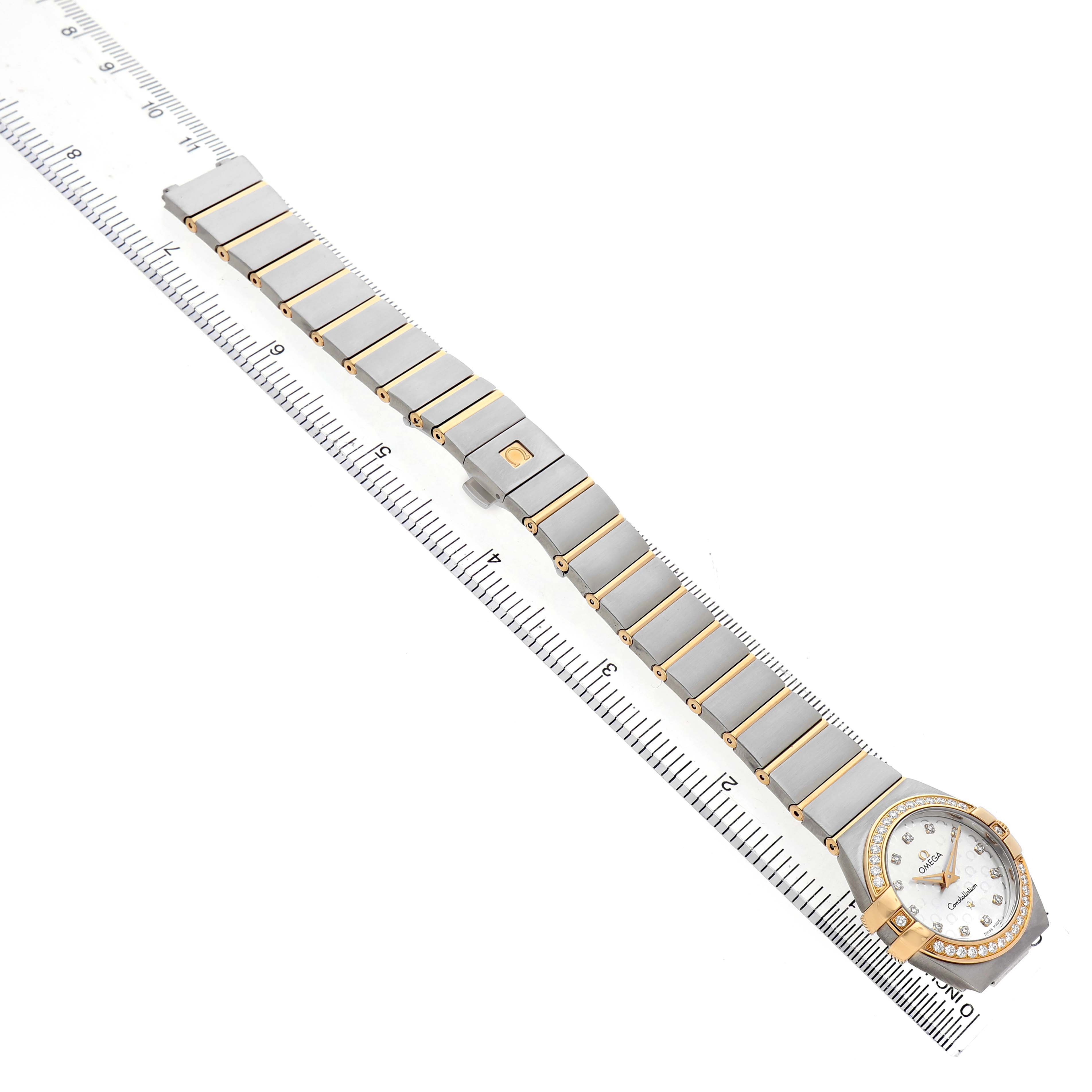 The Omega 123.25.27.60.52.002 Women's Steel and Gold (two tone) Silver Dial Constellation Steel Yellow Gold Diamond Watch is shown flat with the bracelet and diamond bezel visible.