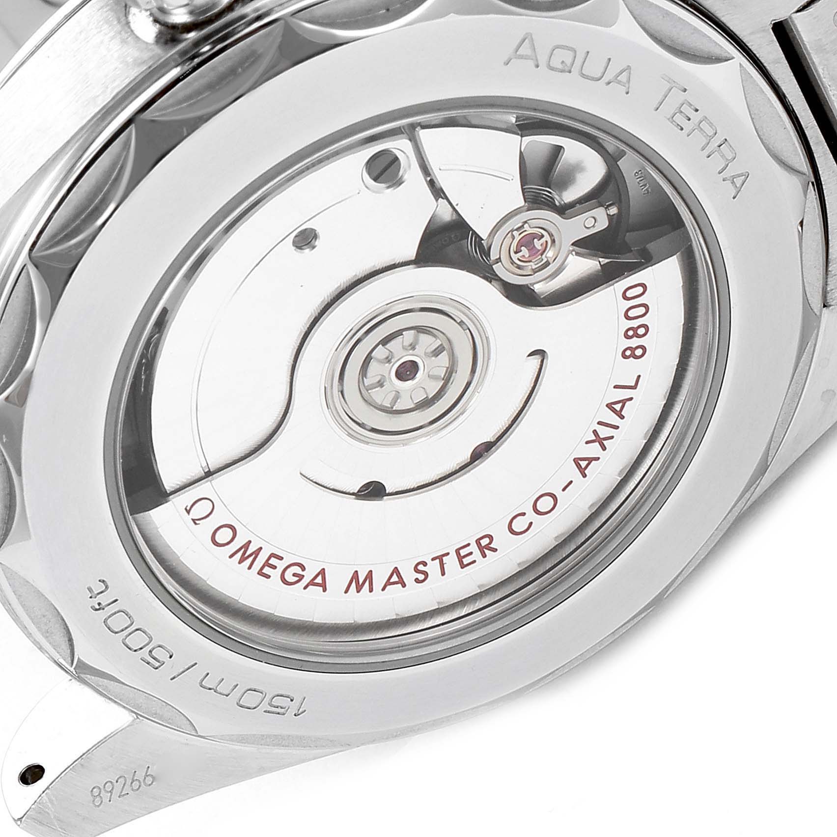 The image shows the back view of an Omega Aqua Terra 220.10.38.20.03.001 Men's Stainless Steel Blue Dial 220.10.38.20.03.001 Men's Stainless Steel Blue Dial watch, highlighting its co-axial master chronometer movement.