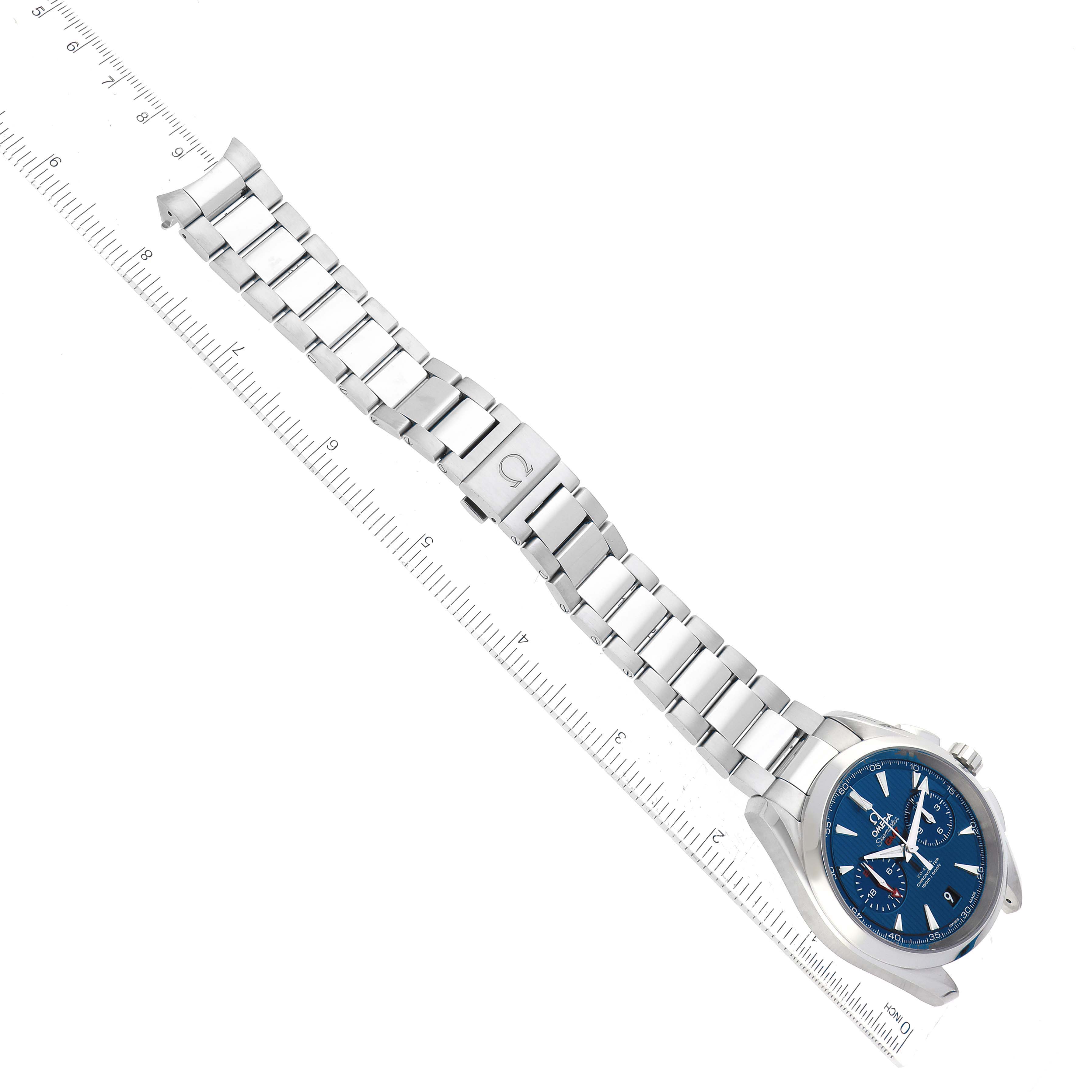 The image shows the Omega Aqua Terra 231.10.43.52.03.001 Men
s Stainless Steel Blue Dial 231.10.43.52.03.001 Men
s Stainless Steel Blue Dial watch laid flat with its bracelet fully extended and measured against a ruler.