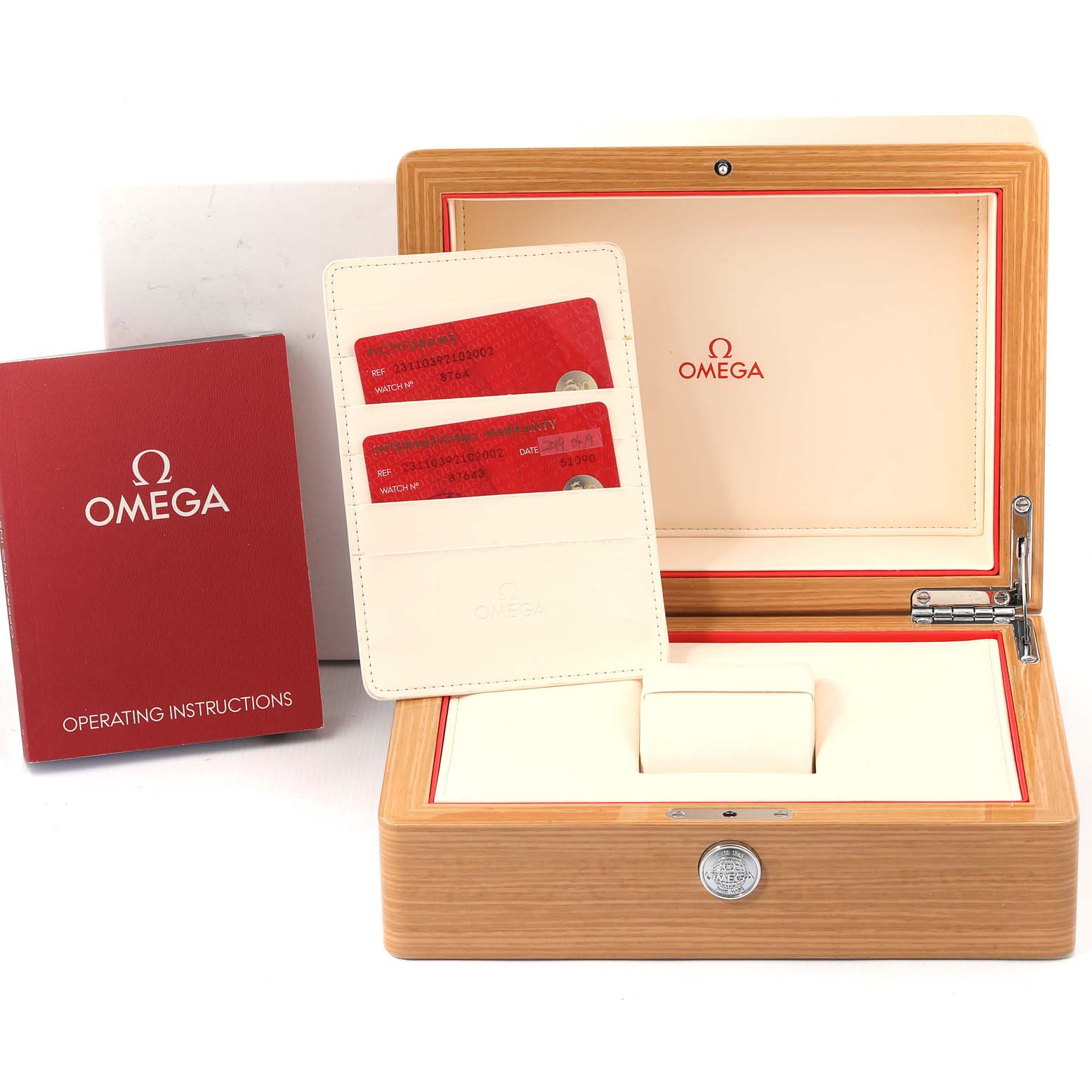 The image shows an Omega Aqua Terra 231.10.39.21.02.002 Men
s Stainless Steel Silver Dial 231.10.39.21.02.002 Men
s Stainless Steel Silver Dial watch box, operating instructions, and warranty cards.