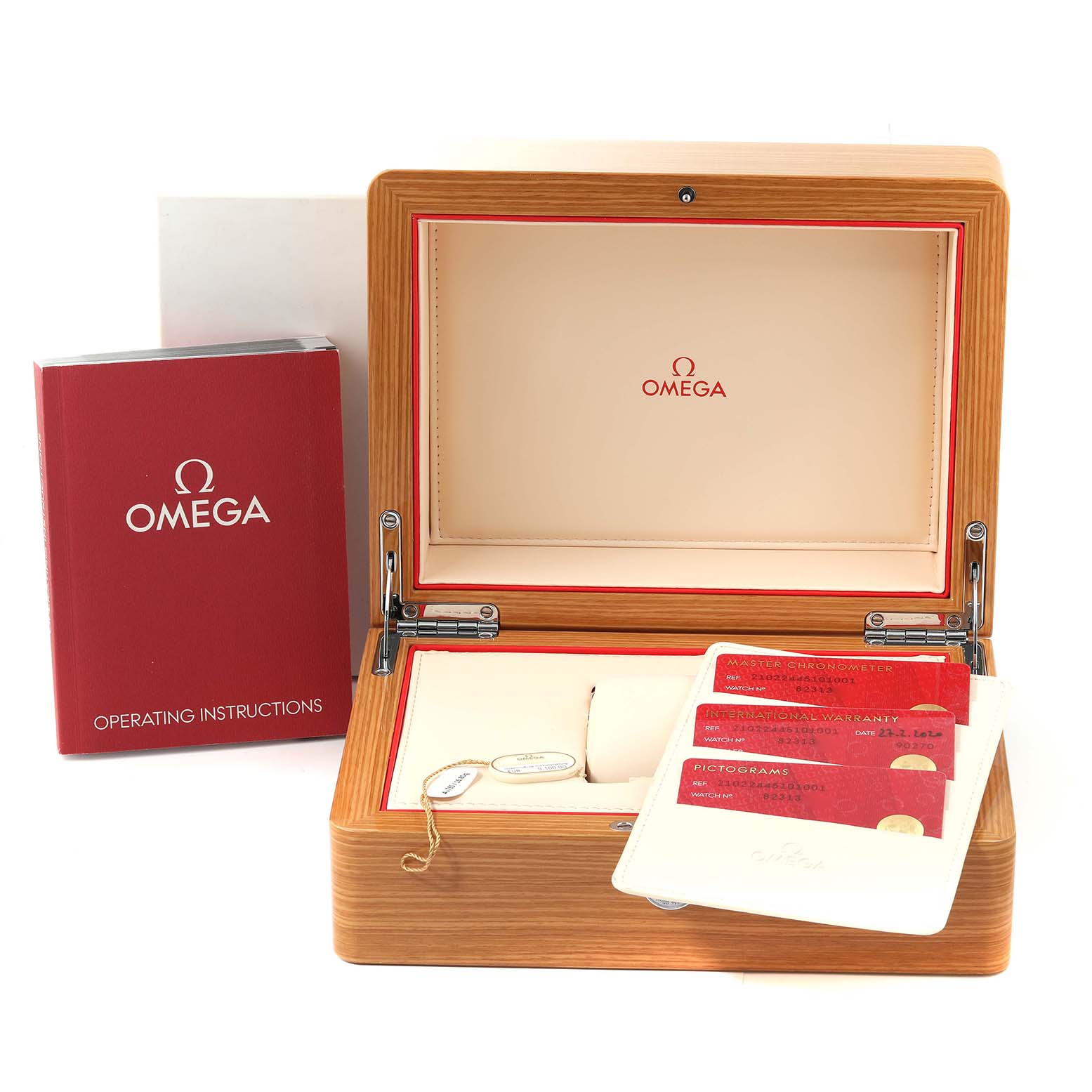 The image shows the presentation box, operating instructions, and warranty cards for an Omega Seamaster 210.22.44.51.01.001 Men's Steel and Gold (two tone) Black Dial 210.22.44.51.01.001 Men's Steel and Gold (two tone) Black Dial watch.