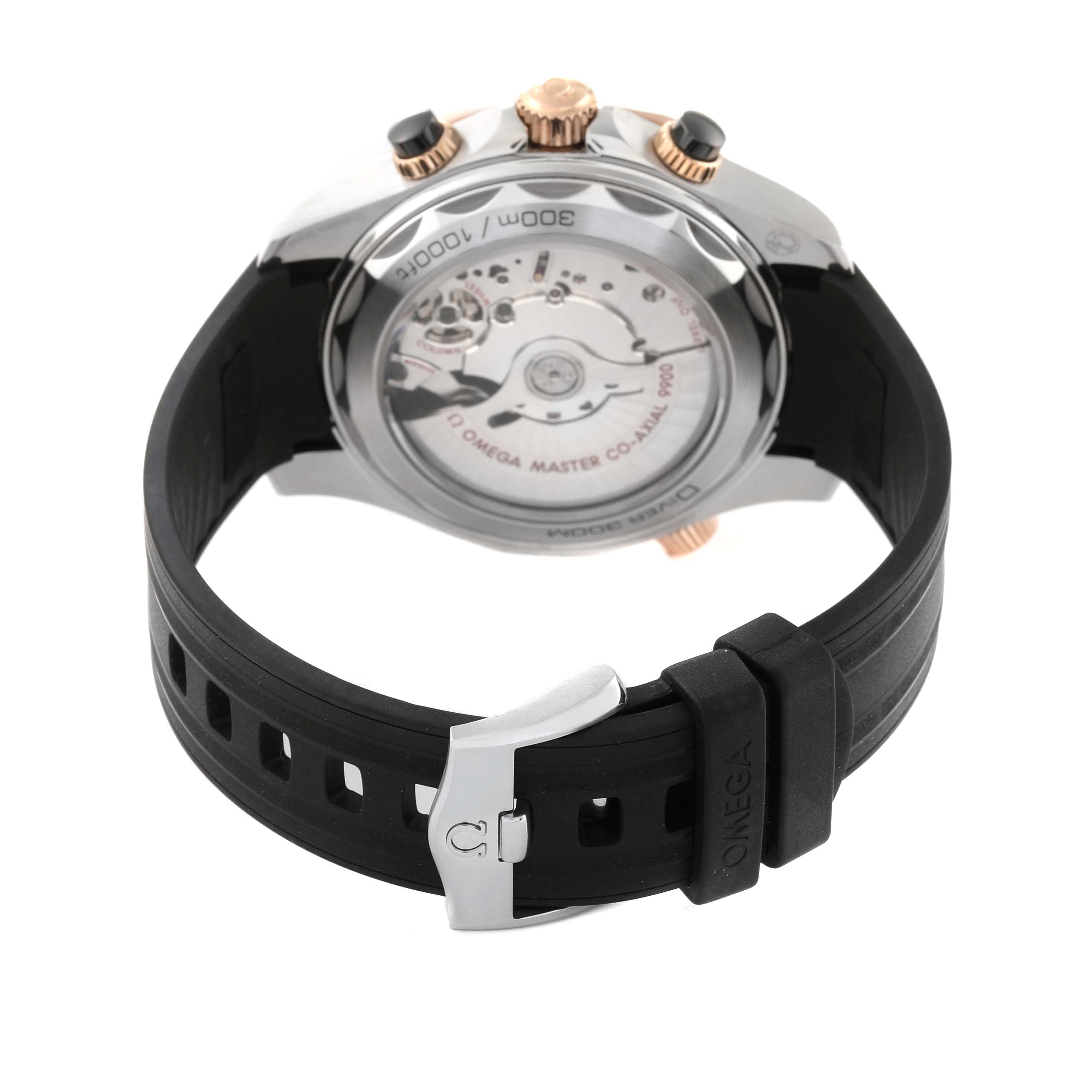 The image displays the back view of an Omega Seamaster 210.22.44.51.01.001 Men's Steel and Gold (two tone) Black Dial 210.22.44.51.01.001 Men's Steel and Gold (two tone) Black Dial watch, highlighting the transparent case back and black rubber strap.