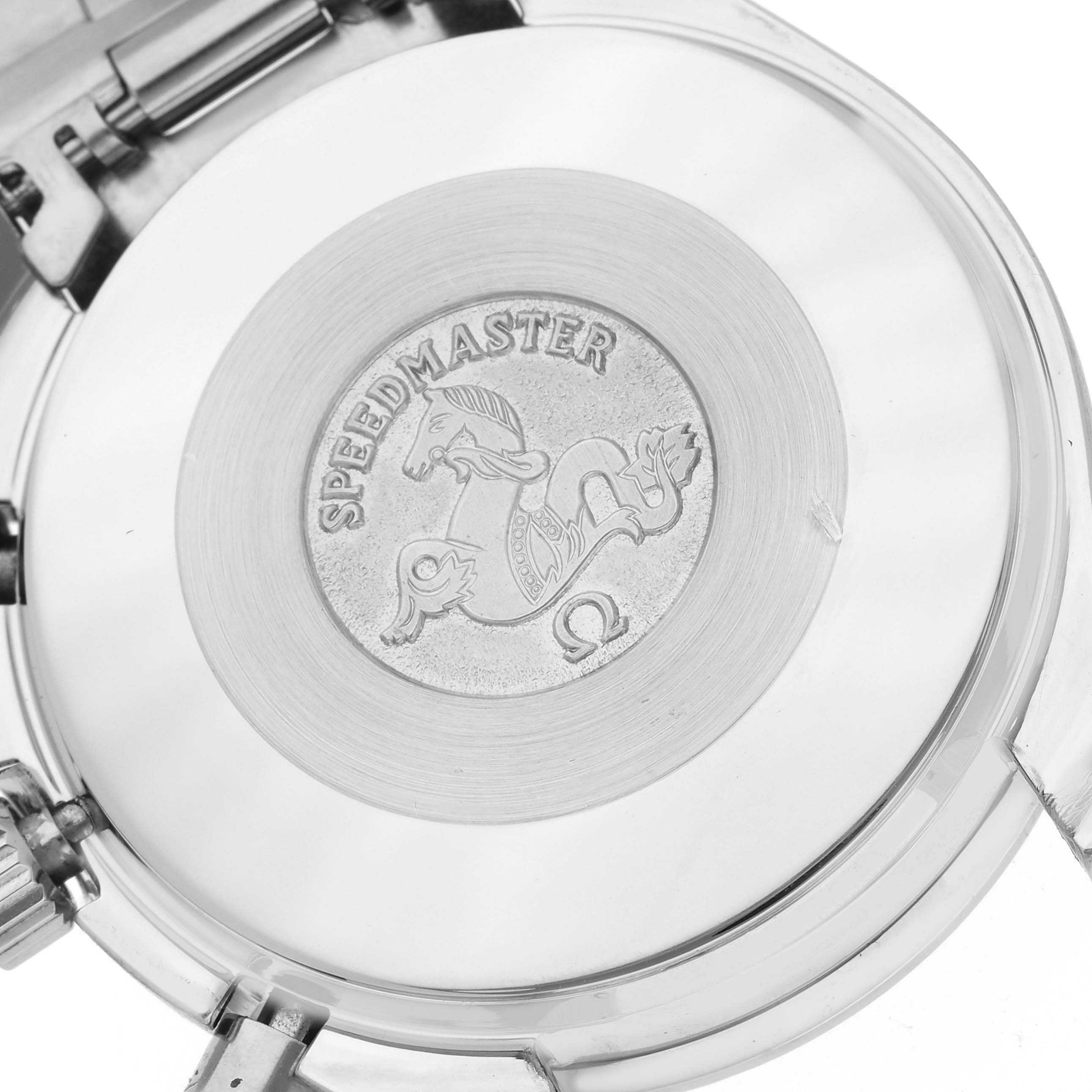 The image shows the engraved case back of an Omega Speedmaster 3510.20.00 Men's Stainless Steel White Dial 3510.20.00 Men's Stainless Steel White Dial watch at a close-up angle.