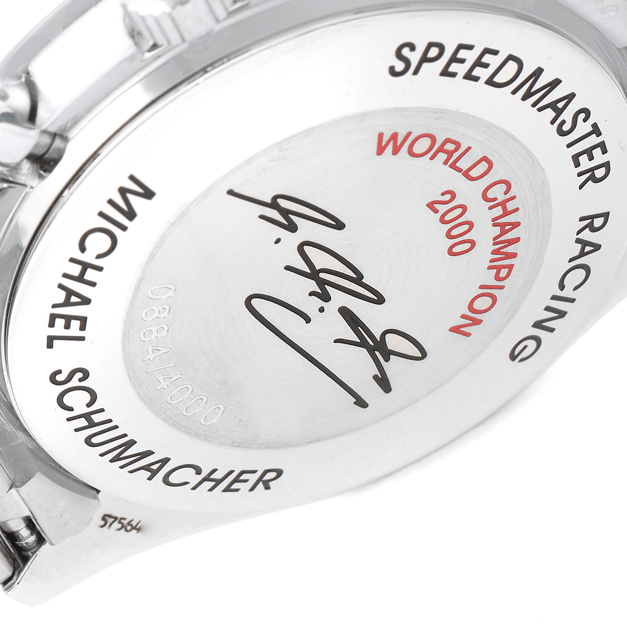 The image shows the back case of an Omega Speedmaster 3517.30.00 Men's Stainless Steel Silver Dial 3517.30.00 Men's Stainless Steel Silver Dial Racing watch, featuring "World Champion 2000" text and a signature.