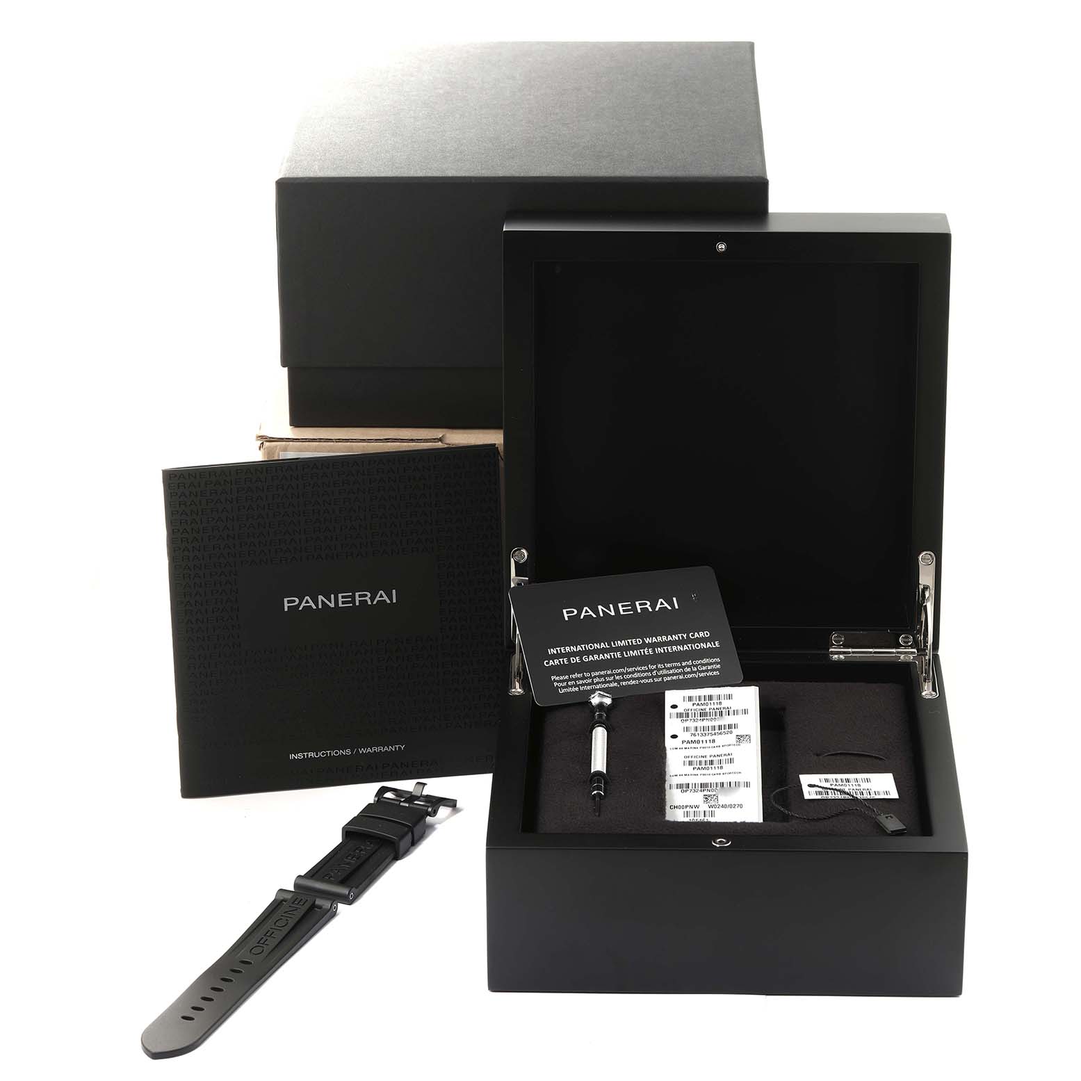 The image shows the Panerai Luminor PAM01118 Men's Ceramic Black Dial PAM01118 Men's Ceramic Black Dial watch box, instruction manual, warranty card, strap, and tools at an angled top view.