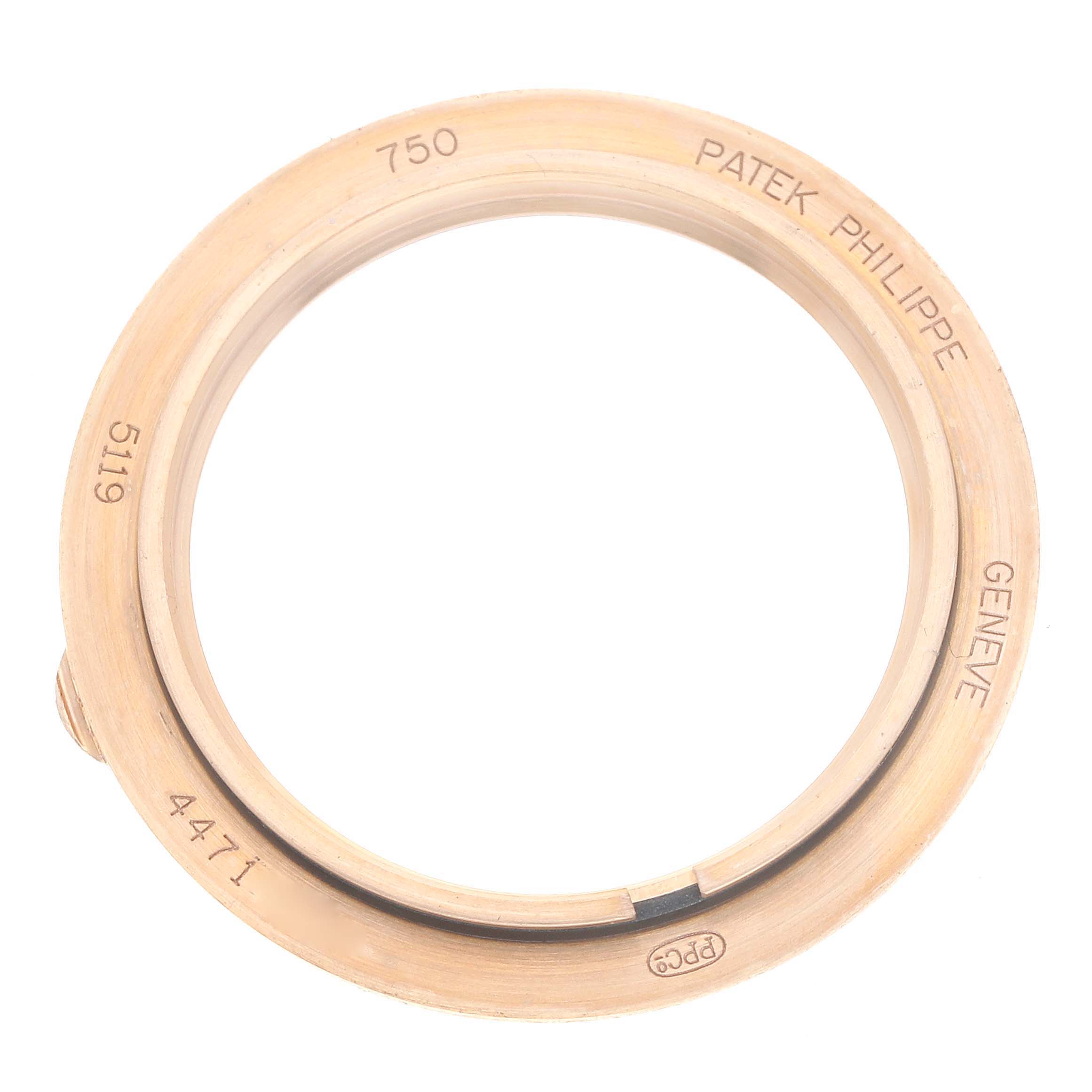 The image shows a top-down view of a Patek Philippe Calatrava 5119R Men's Rose Gold White Dial watch bezel with engravings including "750" and "5119".