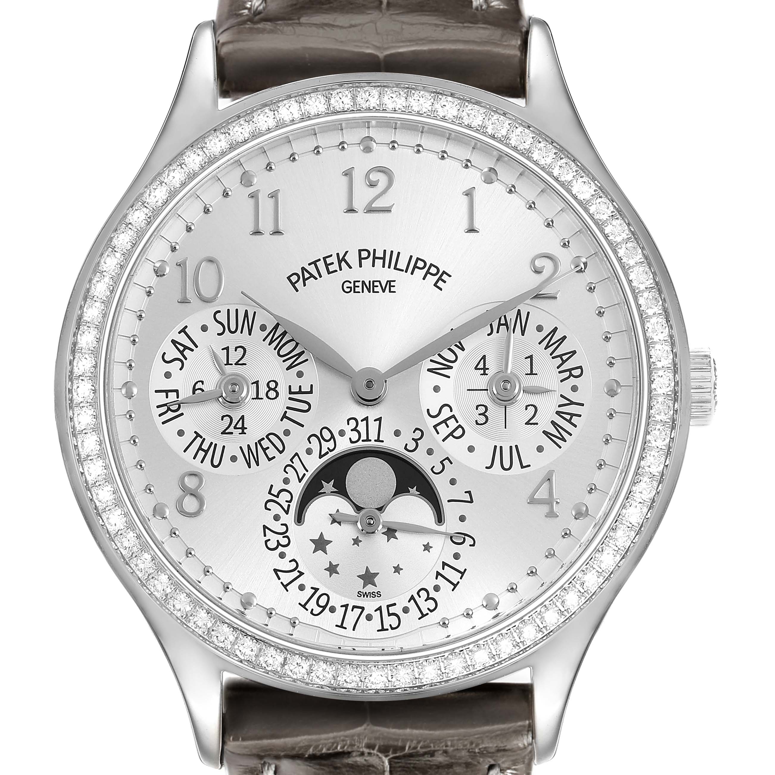 The Patek Philippe Complications 7140G-001 Women's White Gold Silver Dial watch is shown from the front, displaying its dial, moon phase, and calendar features.