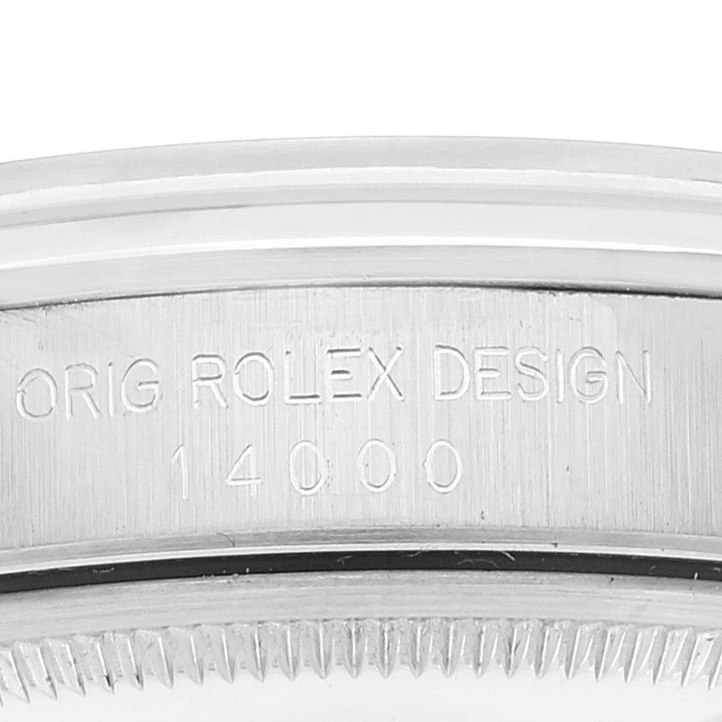 This image shows a close-up of the side engraving and part of the bezel of a Rolex Air-King 14000 Men's Stainless Steel Pink Dial 14000 Men's Stainless Steel Pink Dial watch.