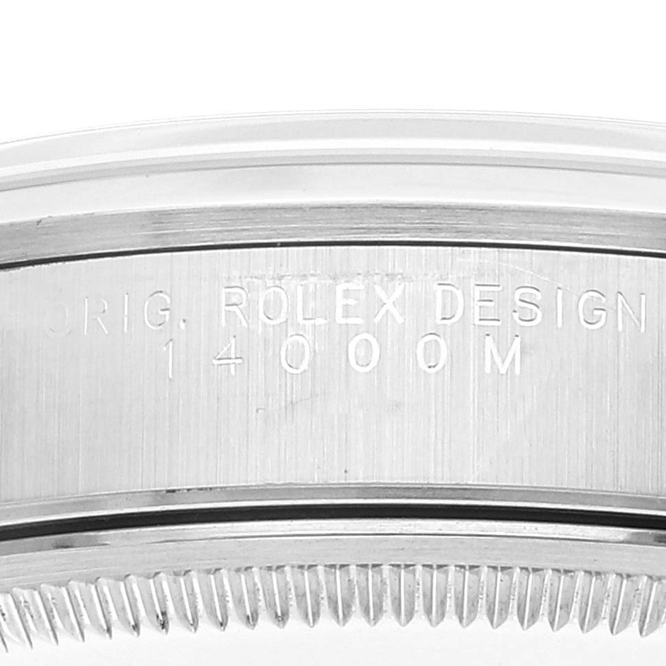 Close-up of the side of a Rolex Air-King 14000M Men's Stainless Steel Black Dial 14000M Men's Stainless Steel Black Dial watch showing "ROLEX DESIGN 14000M" engraved on the case.
