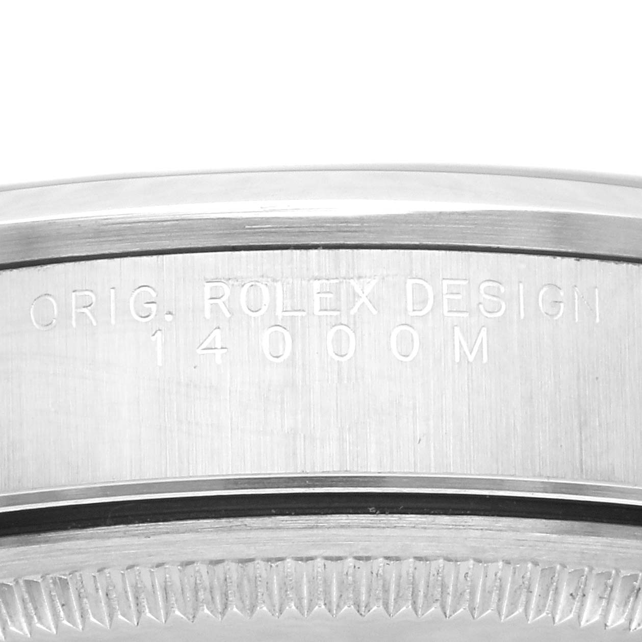 This is a macro shot of the side engraving on the bezel of a Rolex Air-King 14000M Men's Stainless Steel Silver Dial 14000M Men's Stainless Steel Silver Dial watch, displaying "ORIG. ROLEX DESIGN 14000M".