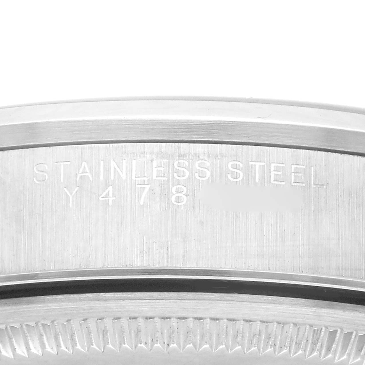 The image shows a close-up of the stainless steel casing with serial numbers on a Rolex Air-King 14000M Men's Stainless Steel Silver Dial 14000M Men's Stainless Steel Silver Dial watch.