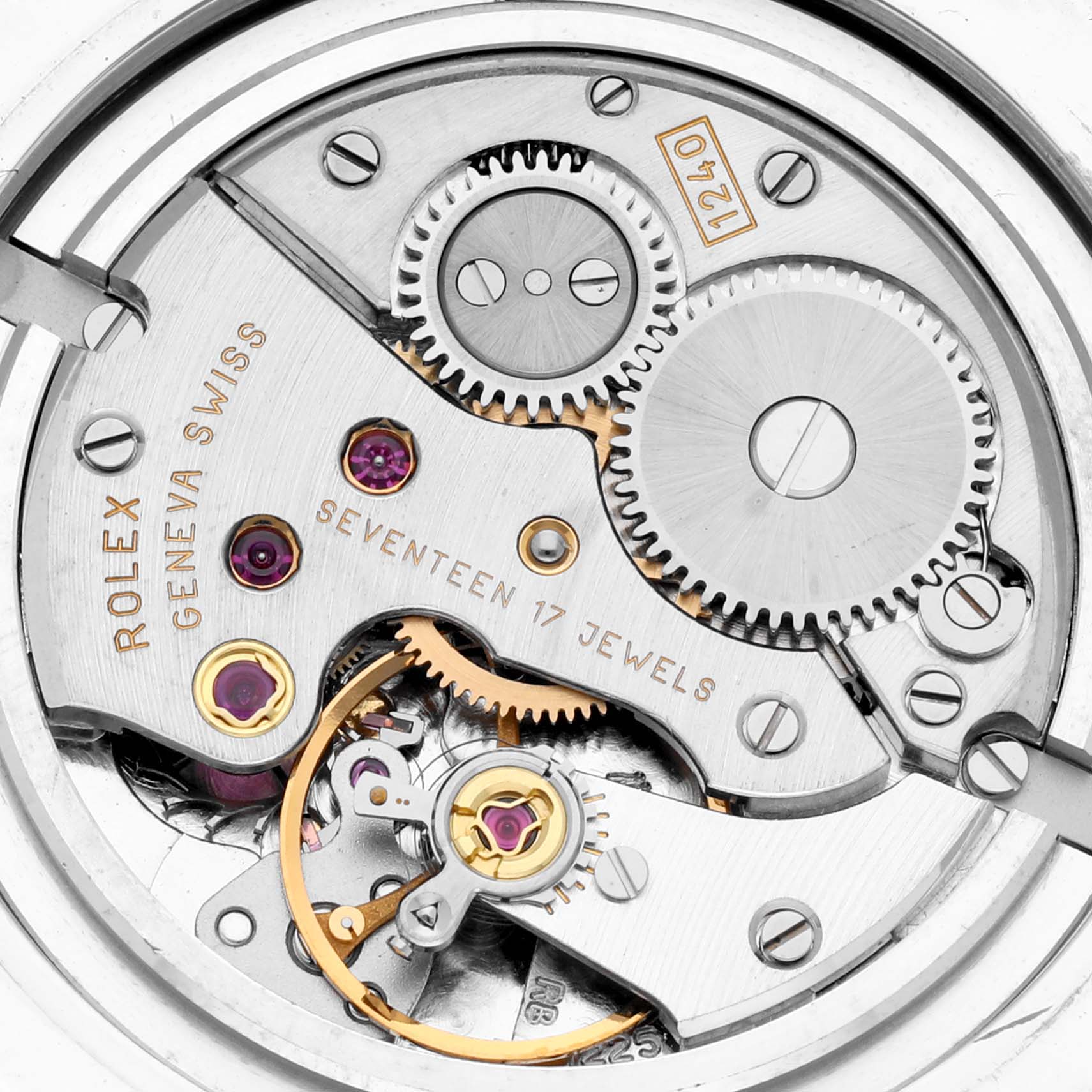 The image shows a close-up of the Rolex Cellini 5240/6 Men
s Platinum Mother of Pearl Dial 5240/6 Men
s Platinum Mother of Pearl Dial watch movement, focusing on various gears and jewels.