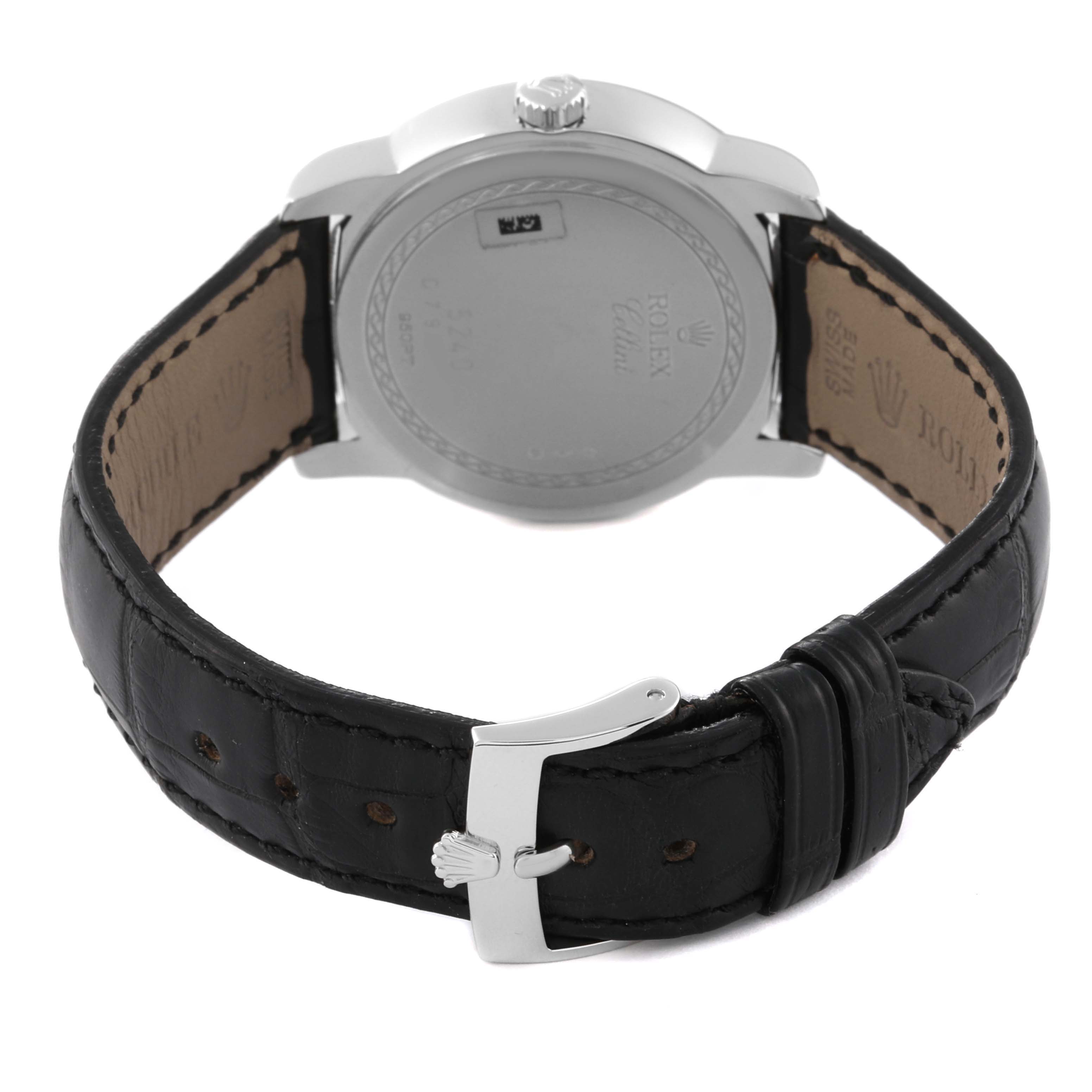 The image shows the back view of a Rolex Cellini 5240/6 Men
s Platinum Mother of Pearl Dial 5240/6 Men
s Platinum Mother of Pearl Dial watch with focus on its leather strap and buckle.