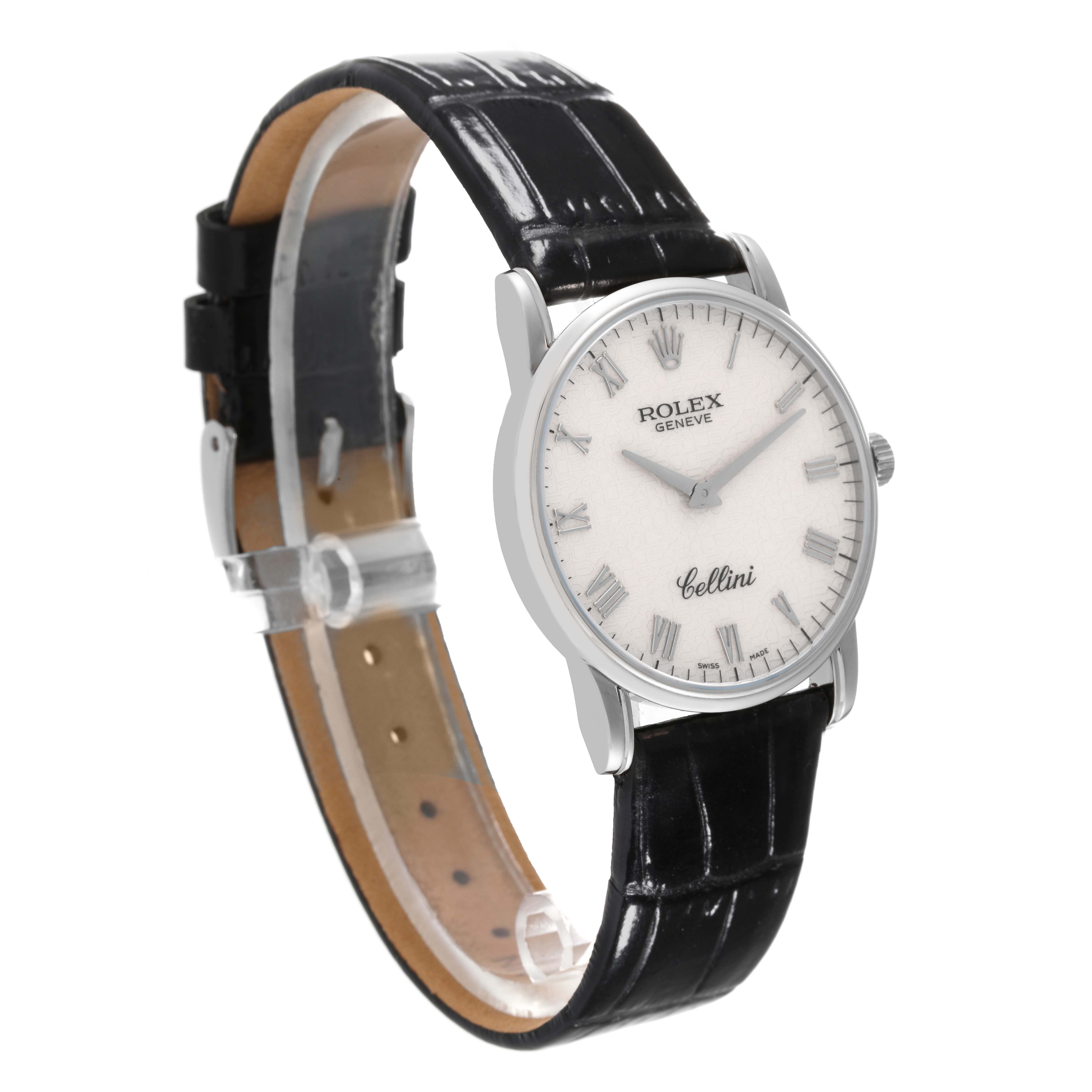 The Rolex Cellini 5116/9 Men
s White Gold Beige Dial 5116/9 Men
s White Gold Beige Dial watch is shown at a three-quarter angle, displaying the black leather strap and white dial with Roman numerals.