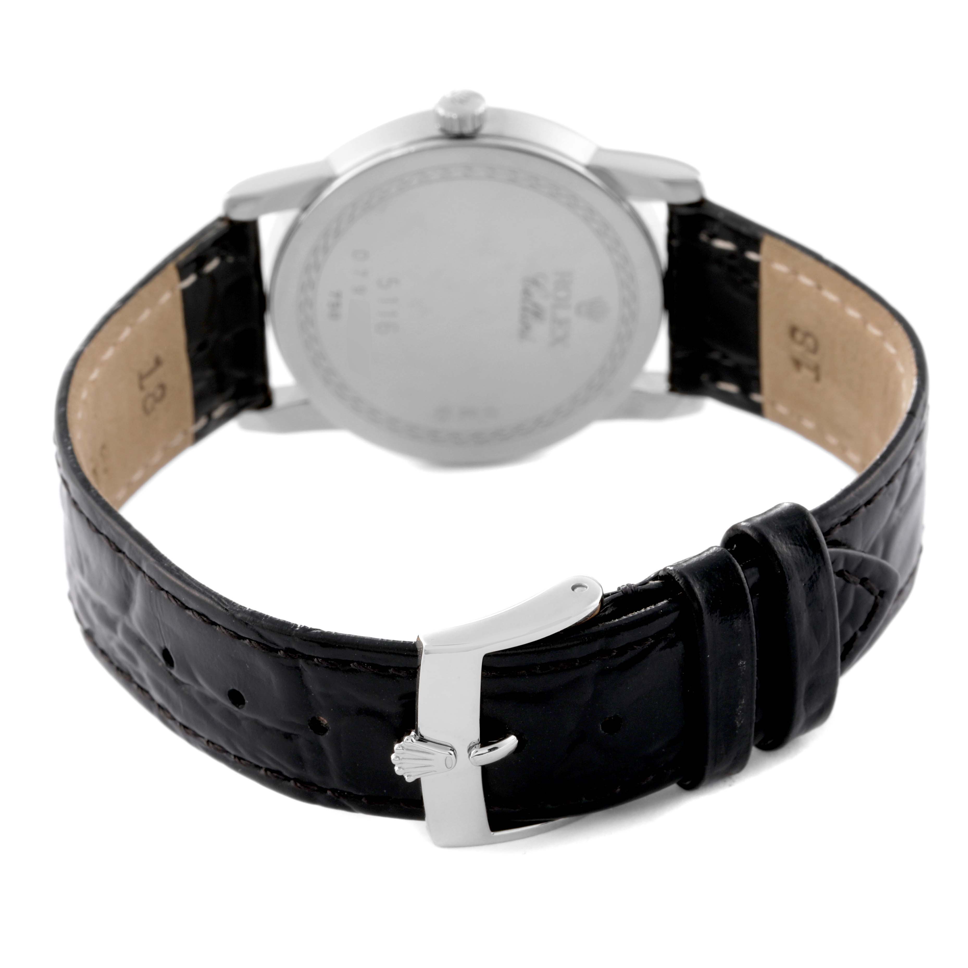 The image shows the Rolex Cellini 5116/9 Men's White Gold Beige Dial 5116/9 Men's White Gold Beige Dial watch from the back, highlighting the case back, lugs, and black leather strap with a buckle.