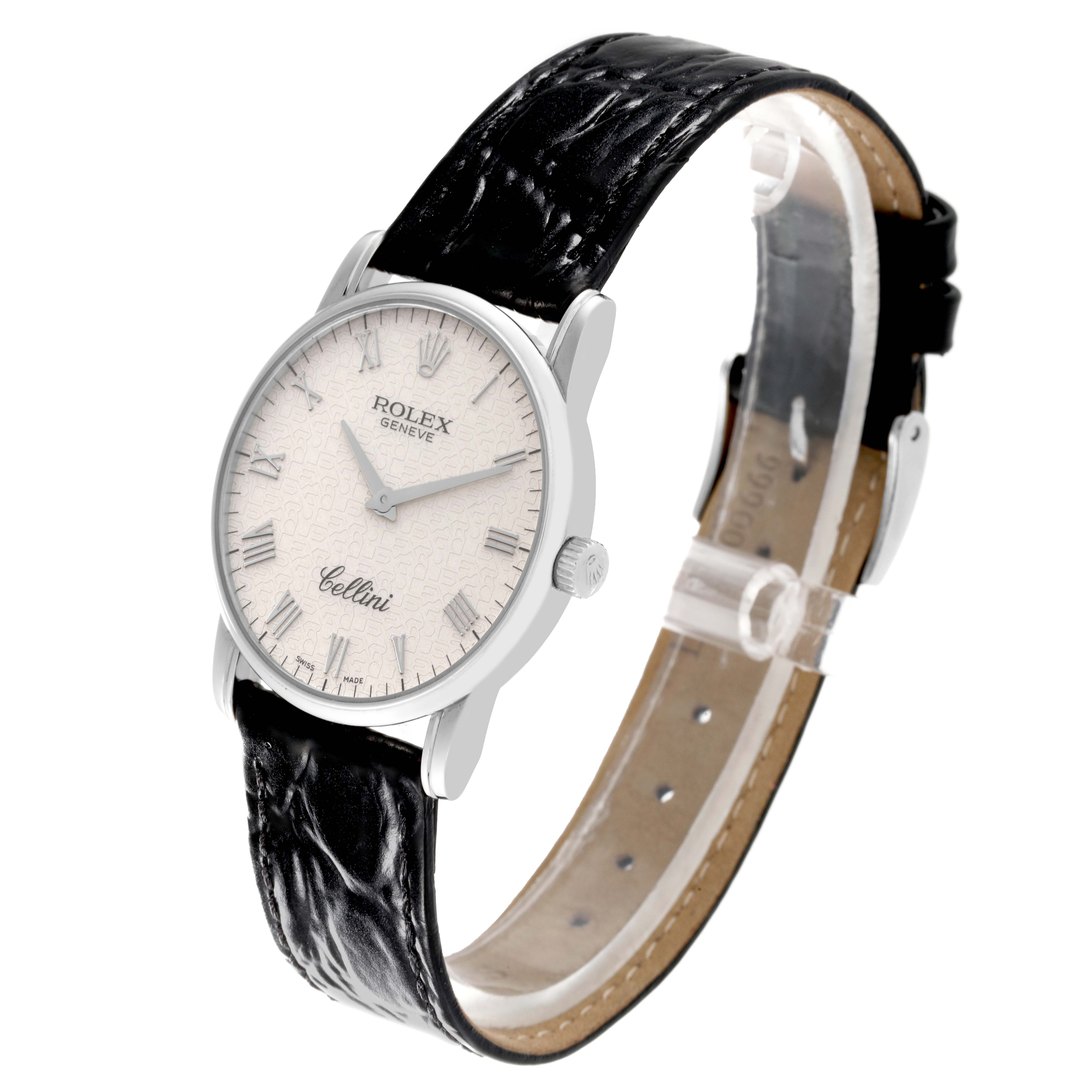 The image shows a Rolex Cellini 5116/9 Men's White Gold Beige Dial 5116/9 Men's White Gold Beige Dial model watch at a three-quarter angle, highlighting its black leather strap and white dial.