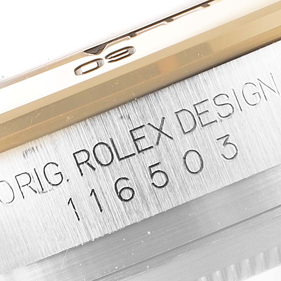 This image shows a close-up of the case back and engraving on a Rolex Daytona 116503 Men's Steel and Gold (two tone) Black Dial 116503 Men's Steel and Gold (two tone) Black Dial watch, highlighting the model number 116503.