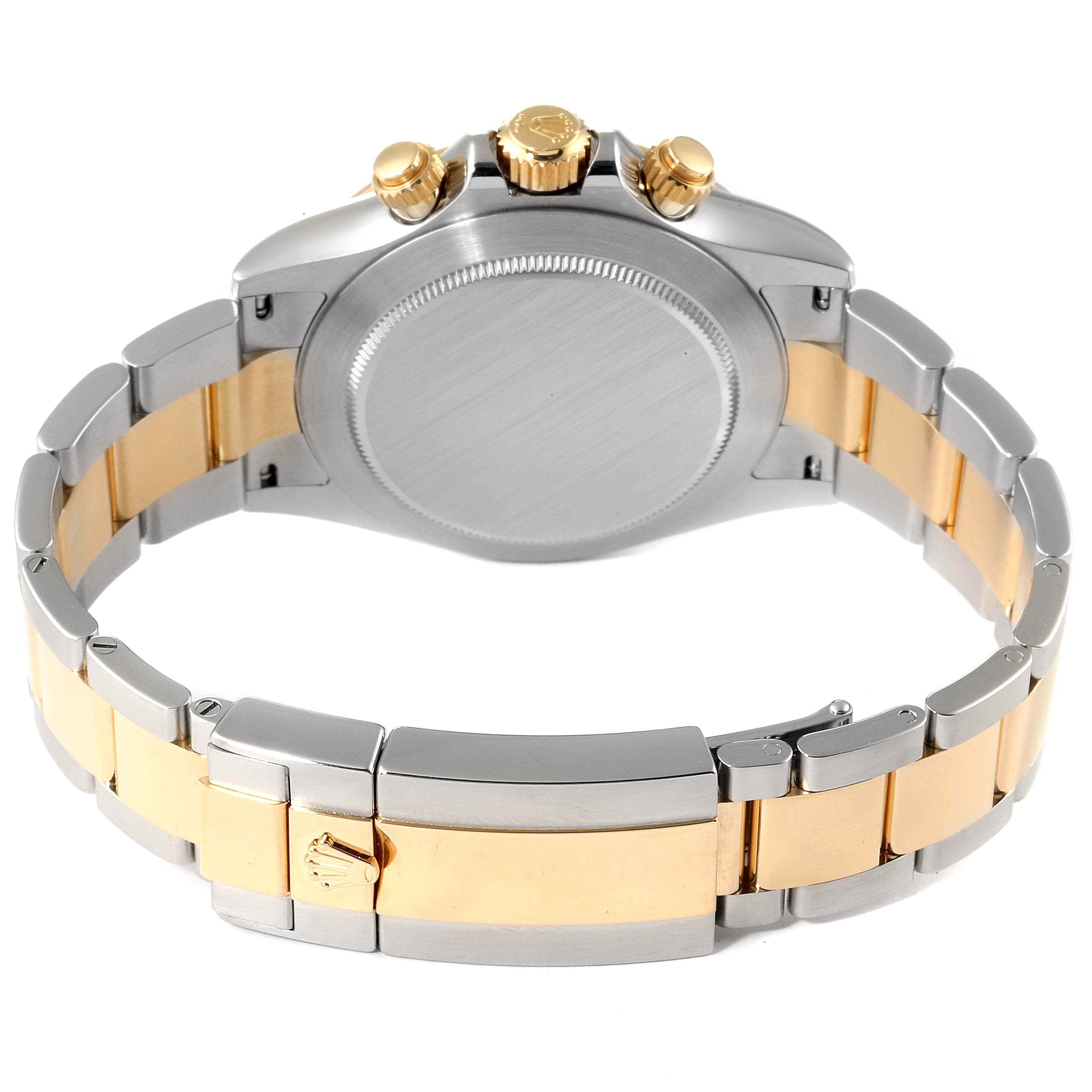 This image shows the back and bracelet of the Rolex Daytona 116503 Men's Steel and Gold (two tone) Black Dial 116503 Men's Steel and Gold (two tone) Black Dial watch featuring a two-tone gold and stainless steel design.