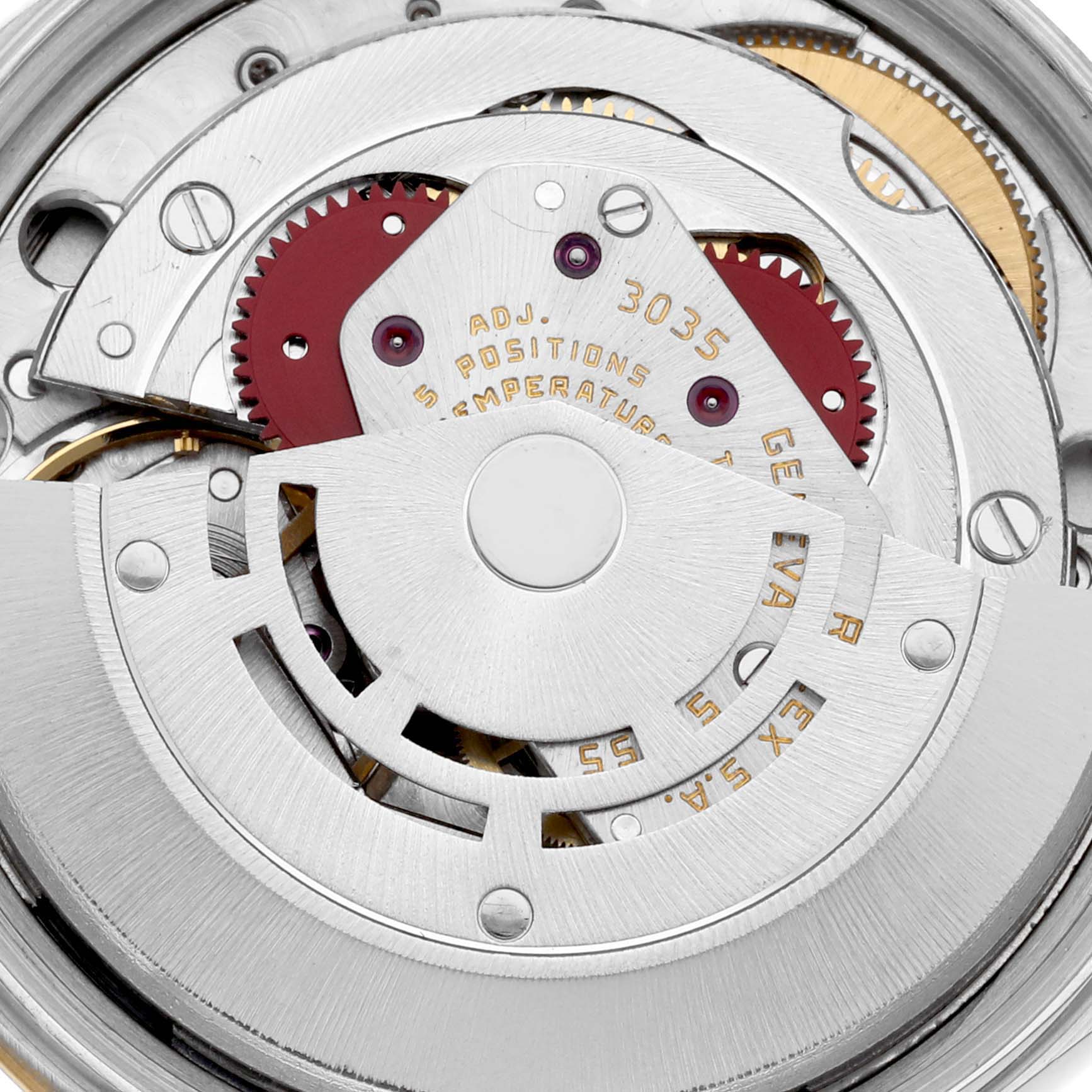 The image shows the internal mechanism of a Rolex Date 15053 Men's Steel and Gold (two tone) Champagne Dial 15053 Men's Steel and Gold (two tone) Champagne Dial watch from a close-up angle, highlighting the movement parts and engravings.