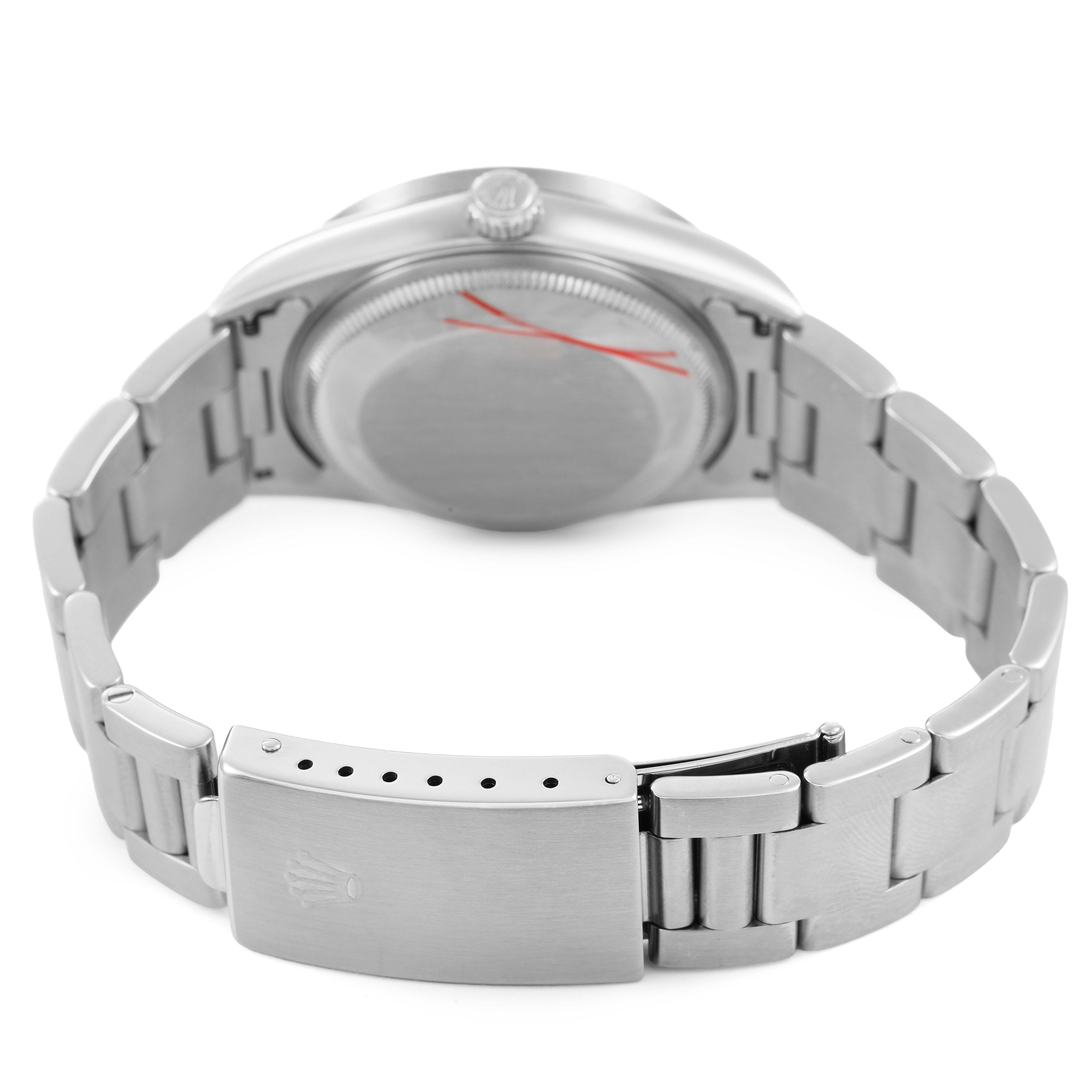 The image shows the Rolex Date 15210 Men's Stainless Steel White Dial watch from the back, highlighting the case back, crown, and the bracelet with the clasp.