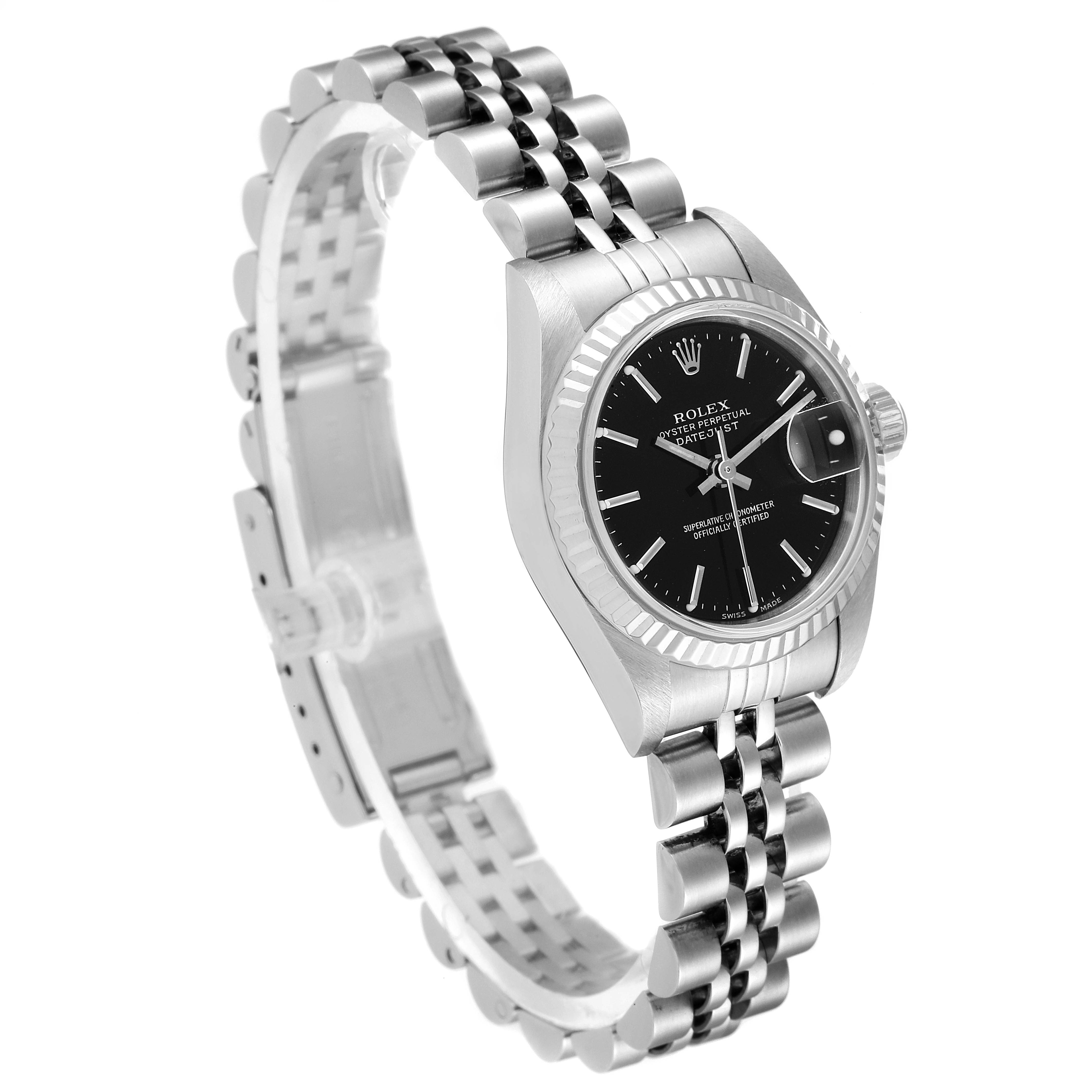 The image shows a left front angle of the Rolex Datejust 79174 Women
s Stainless Steel Black Dial 79174 Women
s Stainless Steel Black Dial watch, highlighting its face, bracelet, and bezel.