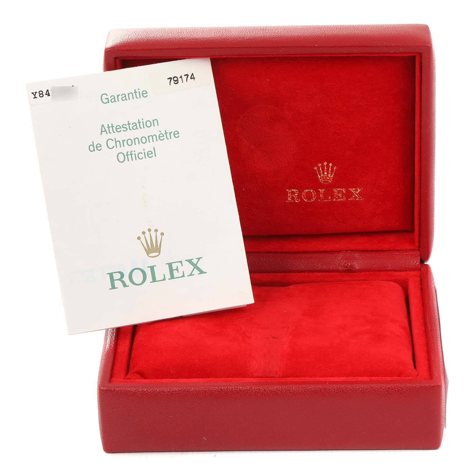 The image shows a Rolex Datejust 79174 Women
s Stainless Steel Black Dial 79174 Women
s Stainless Steel Black Dial watch
s red box and warranty card, viewed from the front.