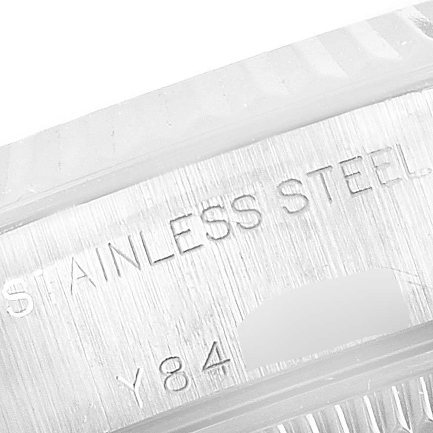 This image shows the engraved side of the Rolex Datejust 79174 Women
s Stainless Steel Black Dial 79174 Women
s Stainless Steel Black Dial watch case, focusing on the stainless steel designation.