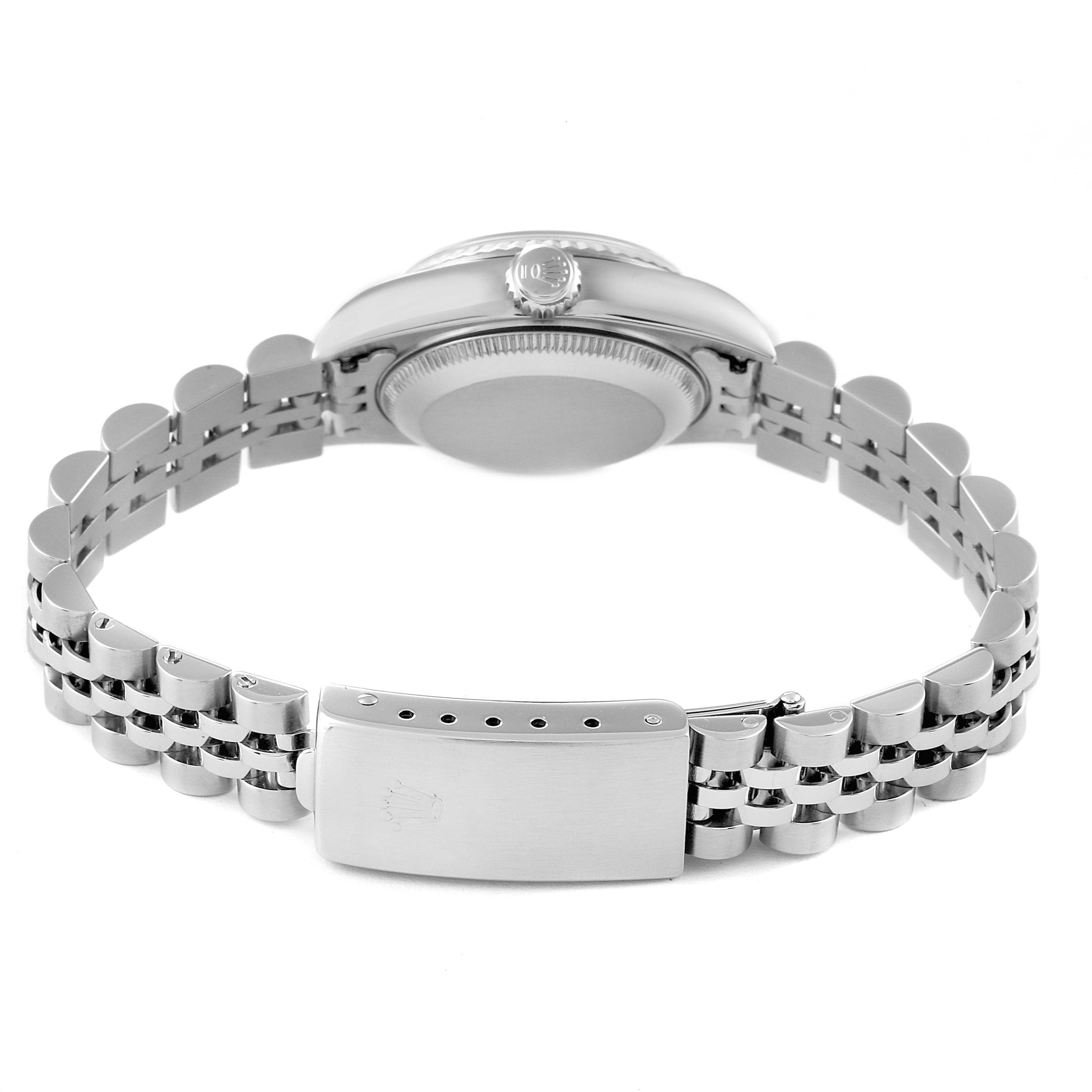 The image shows the back view of the Rolex Datejust 79174 Women
s Stainless Steel Black Dial 79174 Women
s Stainless Steel Black Dial model watch highlighting its clasp and bracelet.