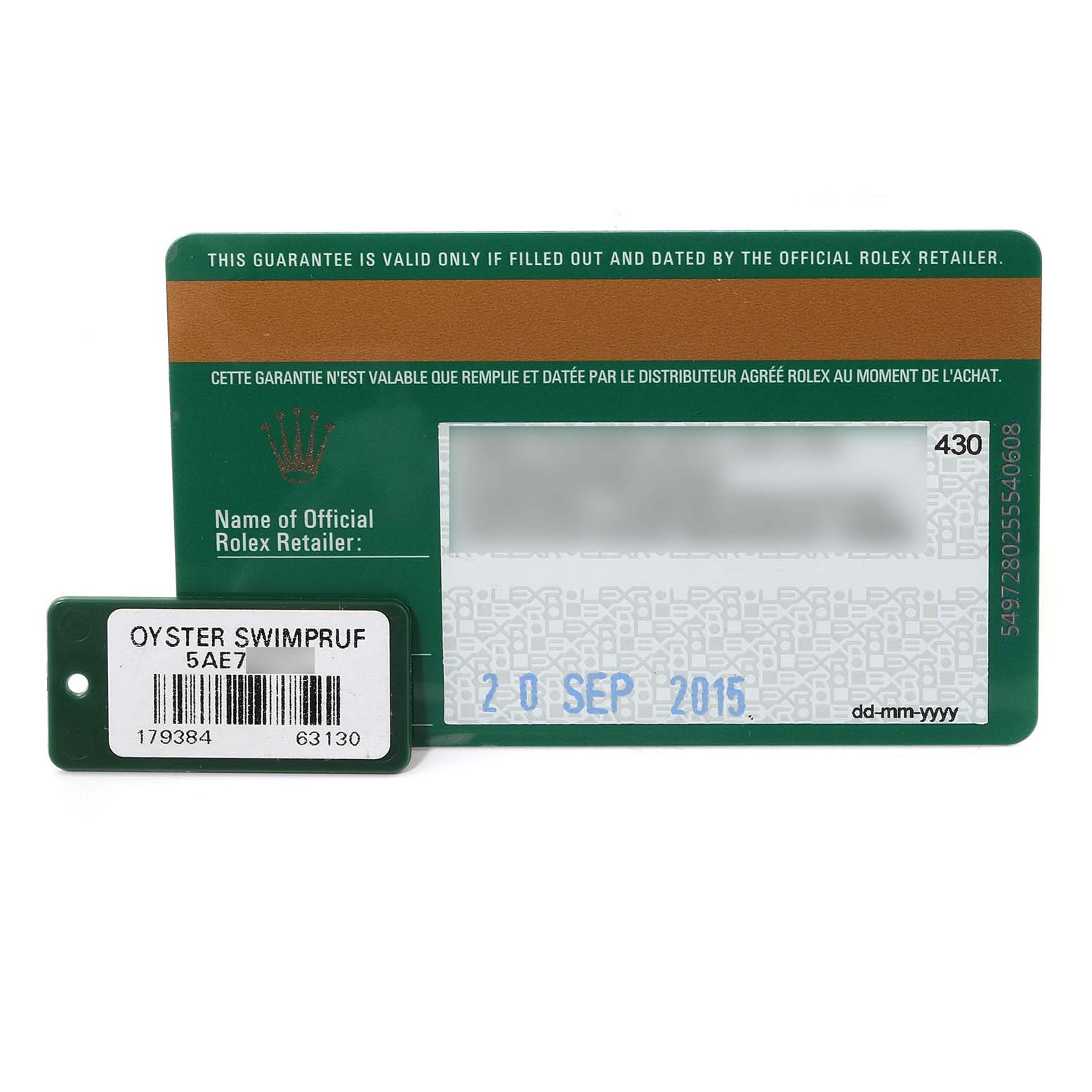 This image shows the warranty card and an Oyster Swimpruf tag for the Rolex Datejust 179384 Women's Stainless Steel Blue Dial 179384 Women's Stainless Steel Blue Dial model.