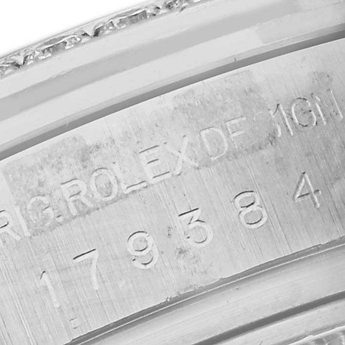 This close-up image shows the engraved inner bezel and model number of a Rolex Datejust 179384 Women's Stainless Steel Blue Dial 179384 Women's Stainless Steel Blue Dial watch.