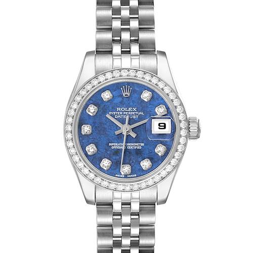 The image shows a frontal view of a Rolex Datejust watch, highlighting its blue dial, date window, and stainless steel bracelet.