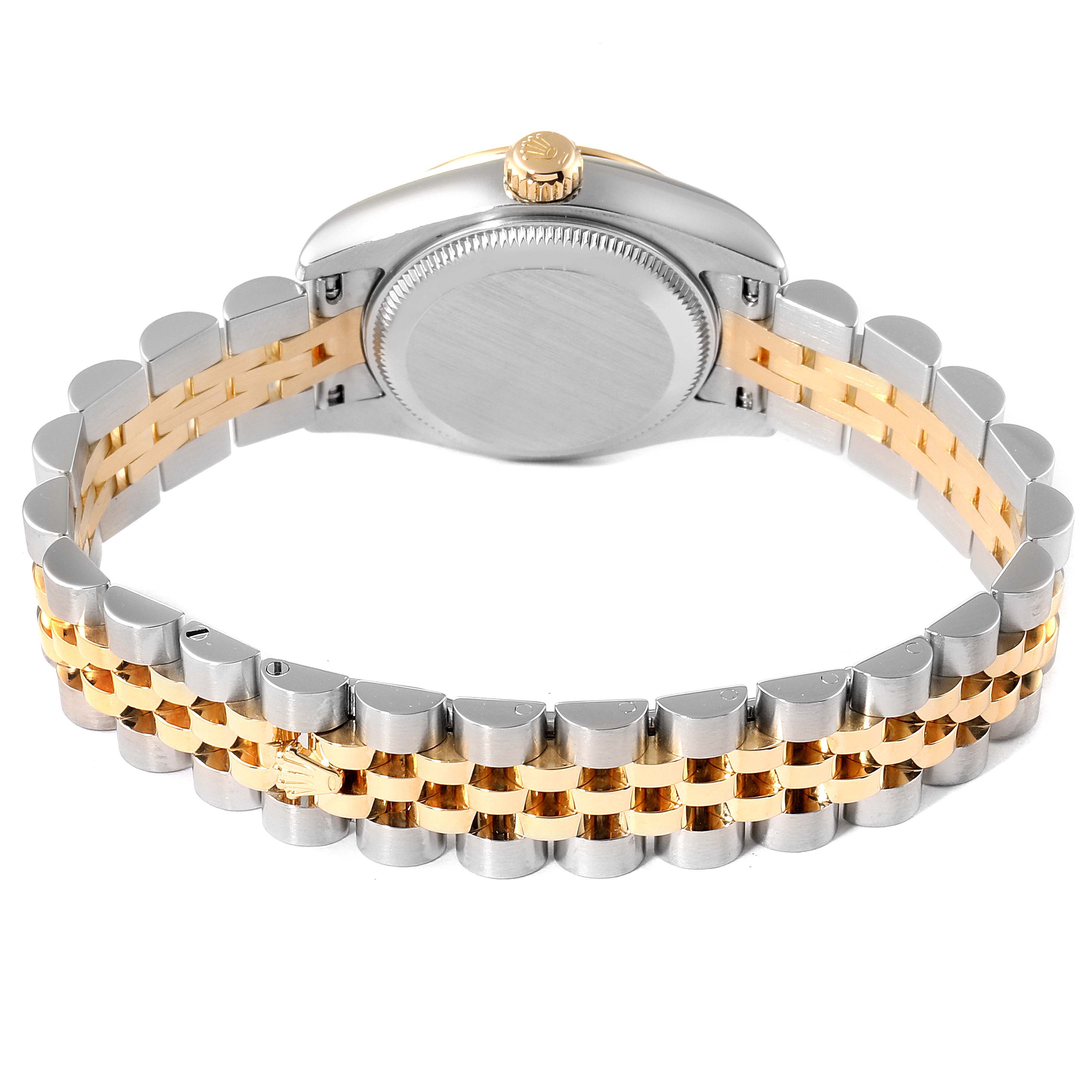 The image shows the back view of a Rolex Datejust 179173 Women's Steel and Gold (two tone) Champagne Dial 179173 Women's Steel and Gold (two tone) Champagne Dial watch, highlighting its stainless steel and gold bracelet and case back.