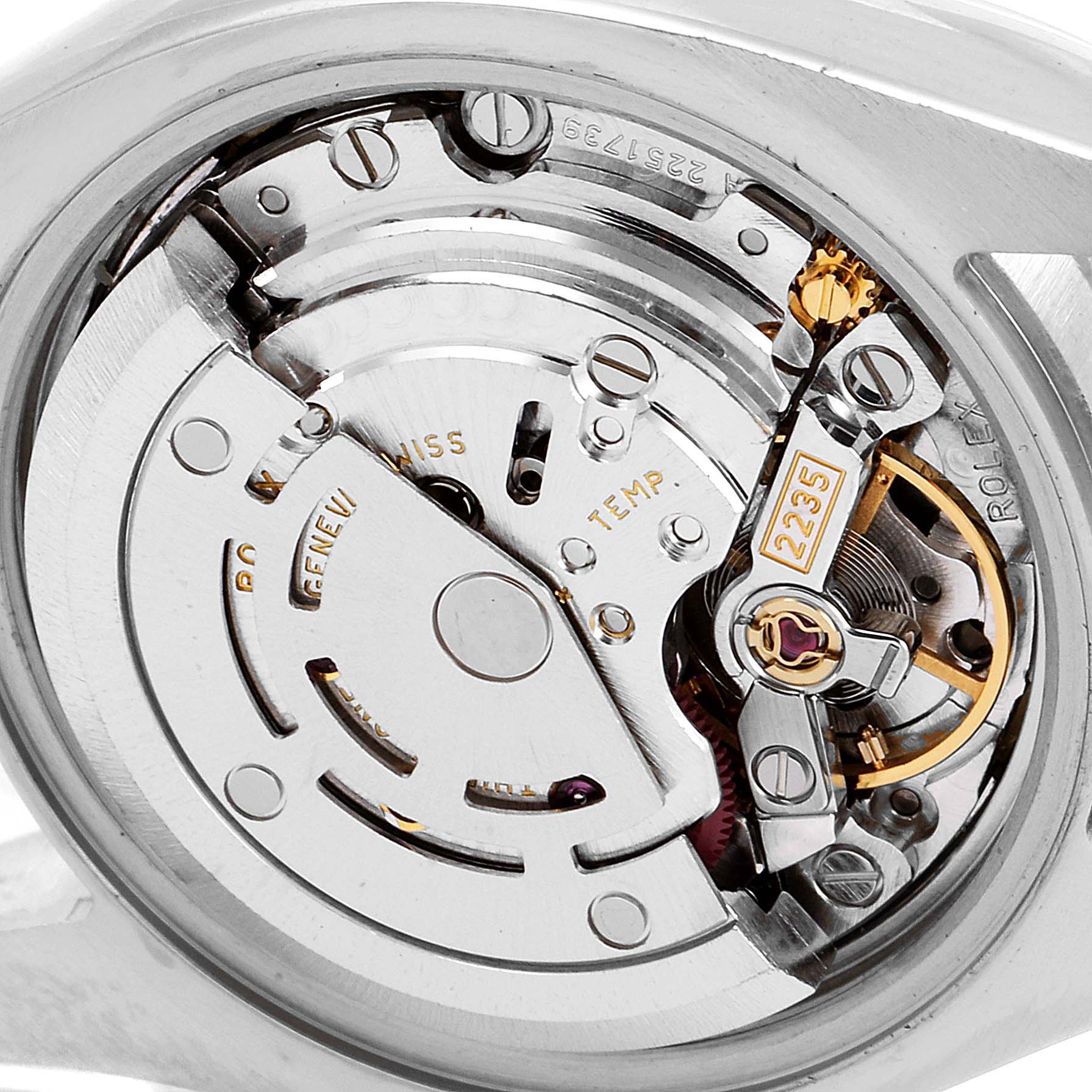 This image shows the internal mechanism of a Rolex Datejust 179173 Women's Steel and Gold (two tone) Champagne Dial 179173 Women's Steel and Gold (two tone) Champagne Dial watch from a close-up, angled view without the case back.