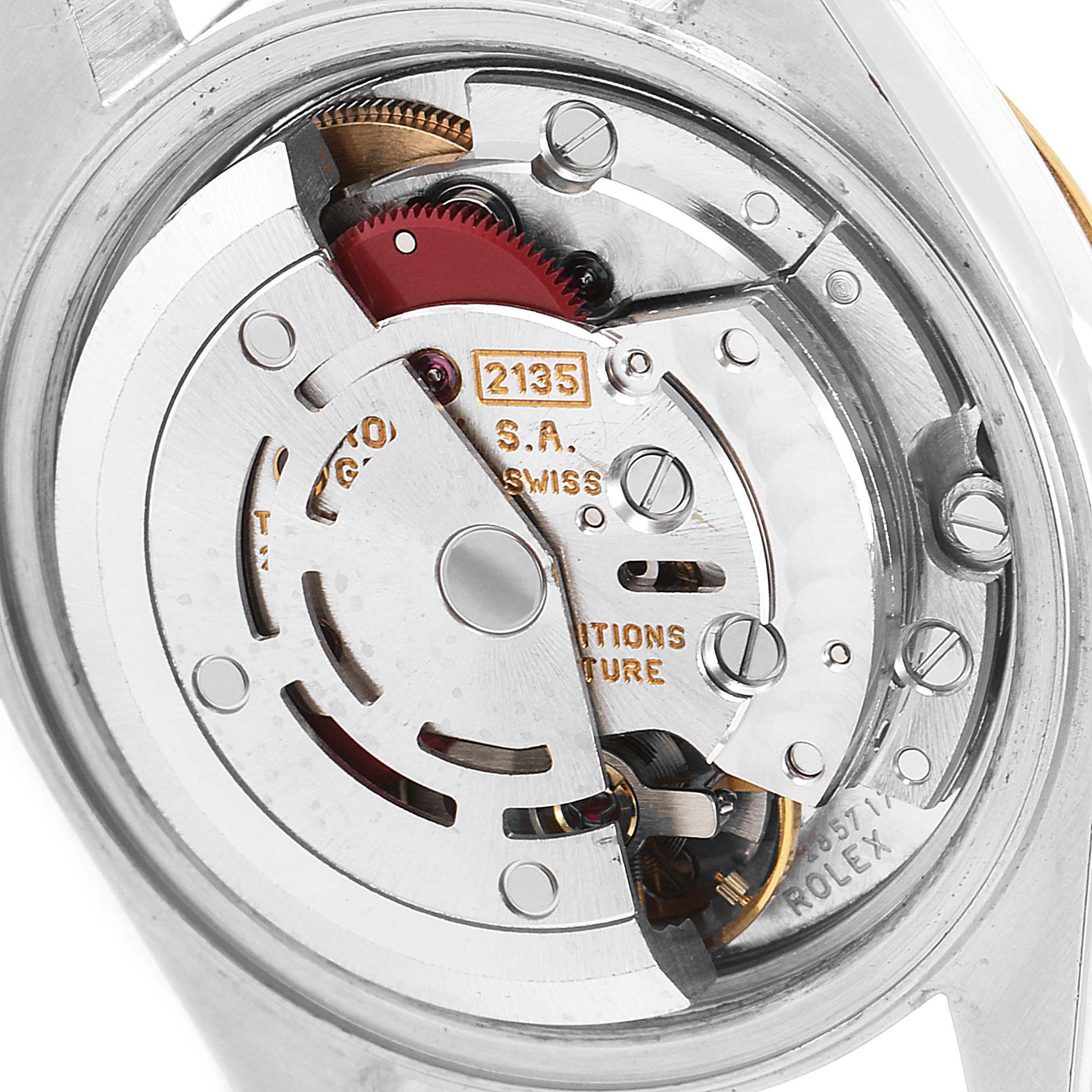This is a close-up shot of the movement and inner mechanics of a Rolex Datejust 69173 Women's Steel and Gold (two tone) Champagne Dial 69173 Women's Steel and Gold (two tone) Champagne Dial watch.