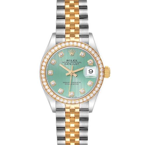 The image shows a frontal view of a Rolex Datejust watch with a green dial, diamond markers, and a two-tone bracelet.