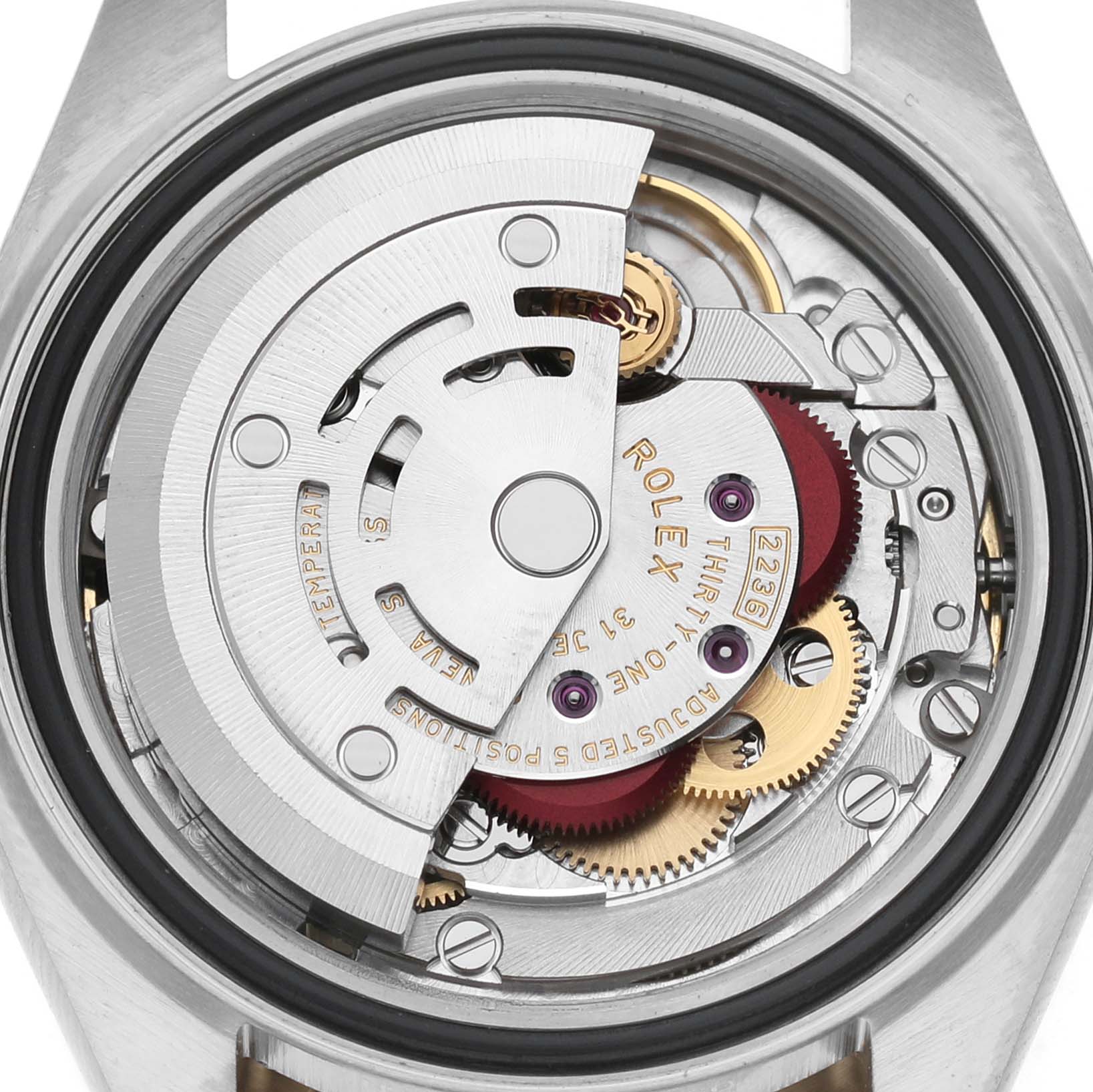 The image shows the movement of a Rolex Datejust 279173 Women's Stainless Steel Champagne Dial watch from the back, highlighting gears and the rotor.