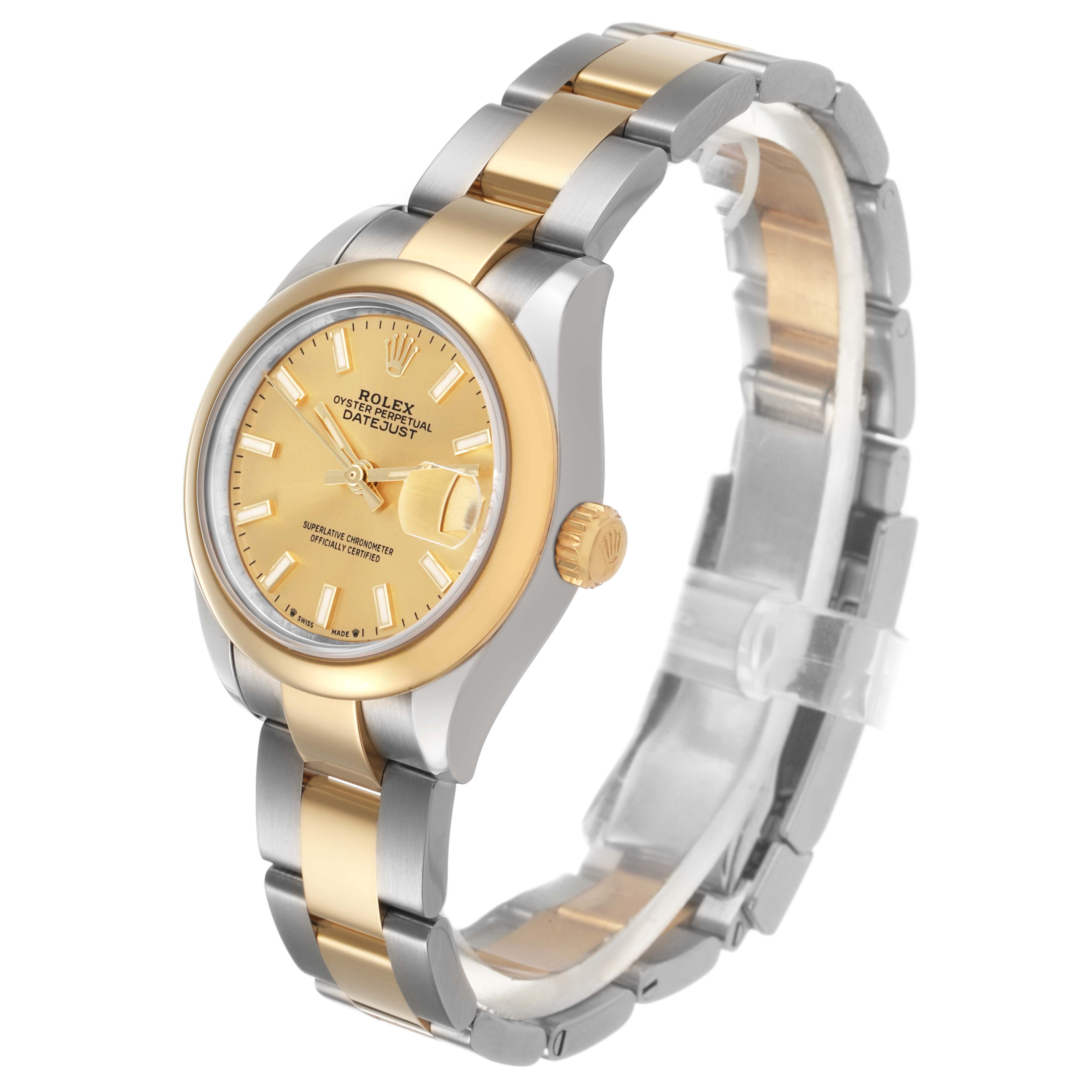 The Rolex Datejust 279173 Women's Stainless Steel Champagne Dial watch is shown at a side angle, highlighting its gold and silver bracelet, bezel, and dial.